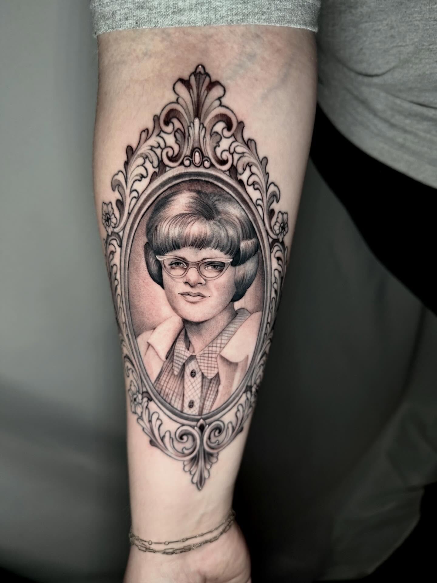 Portrait realism tattoo on the forearm by Joi Bailey, Denton, Texas