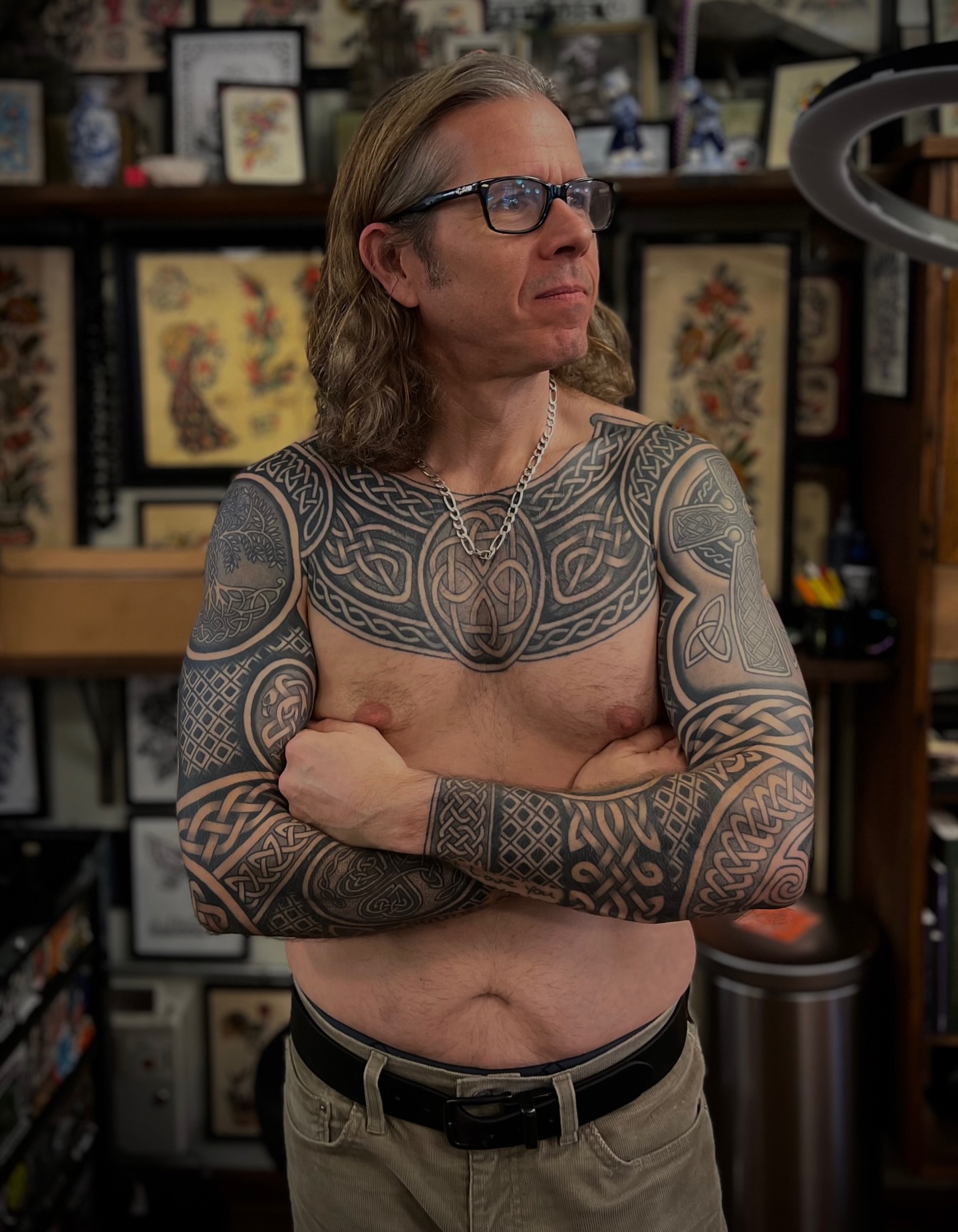 Celtic knotwork black and grey tattoo on the torso by Brian Visser