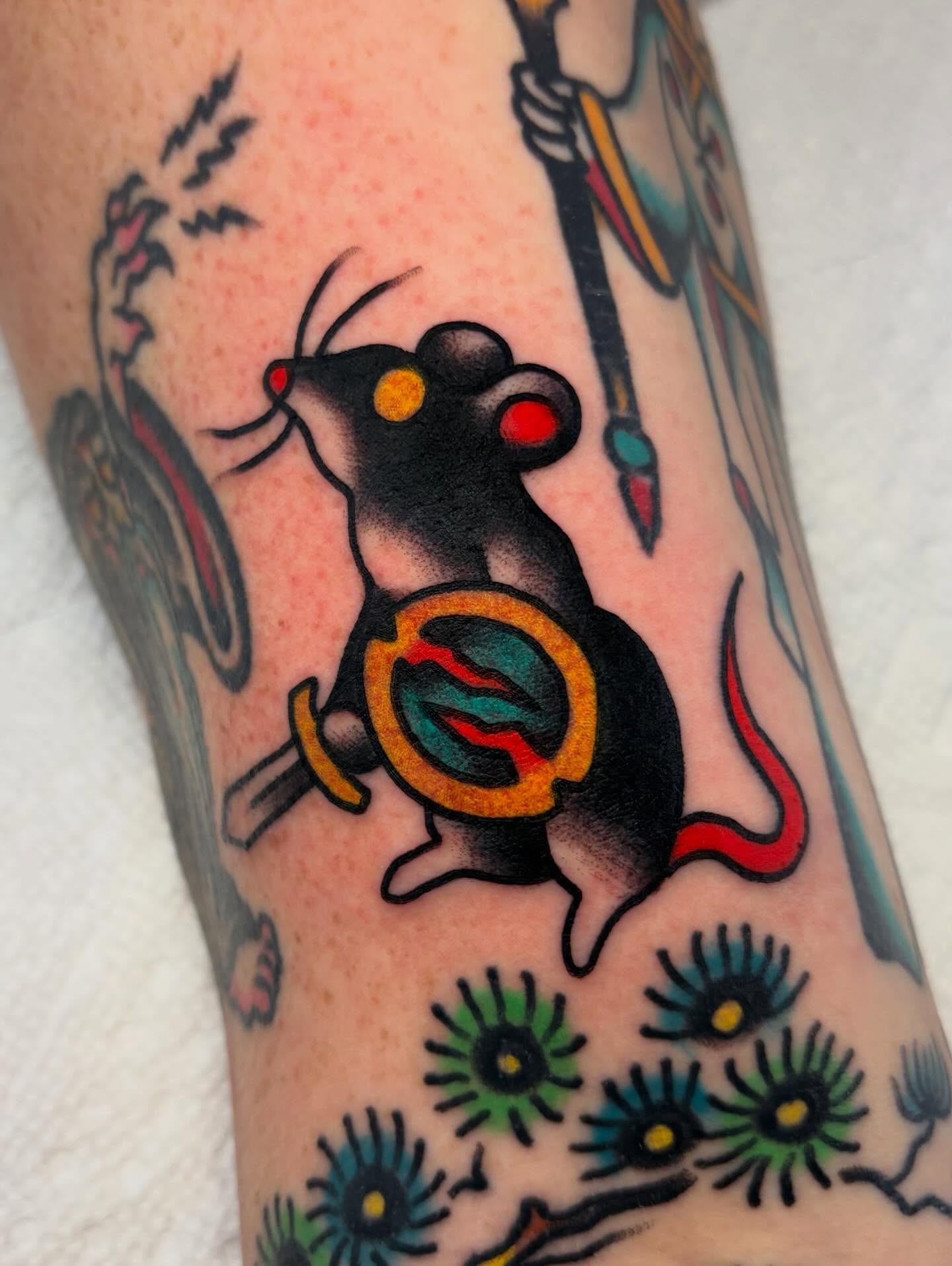 Mouse with shield American traditional tattoo on the forearm by David Armacost, Cincinnati, Ohio