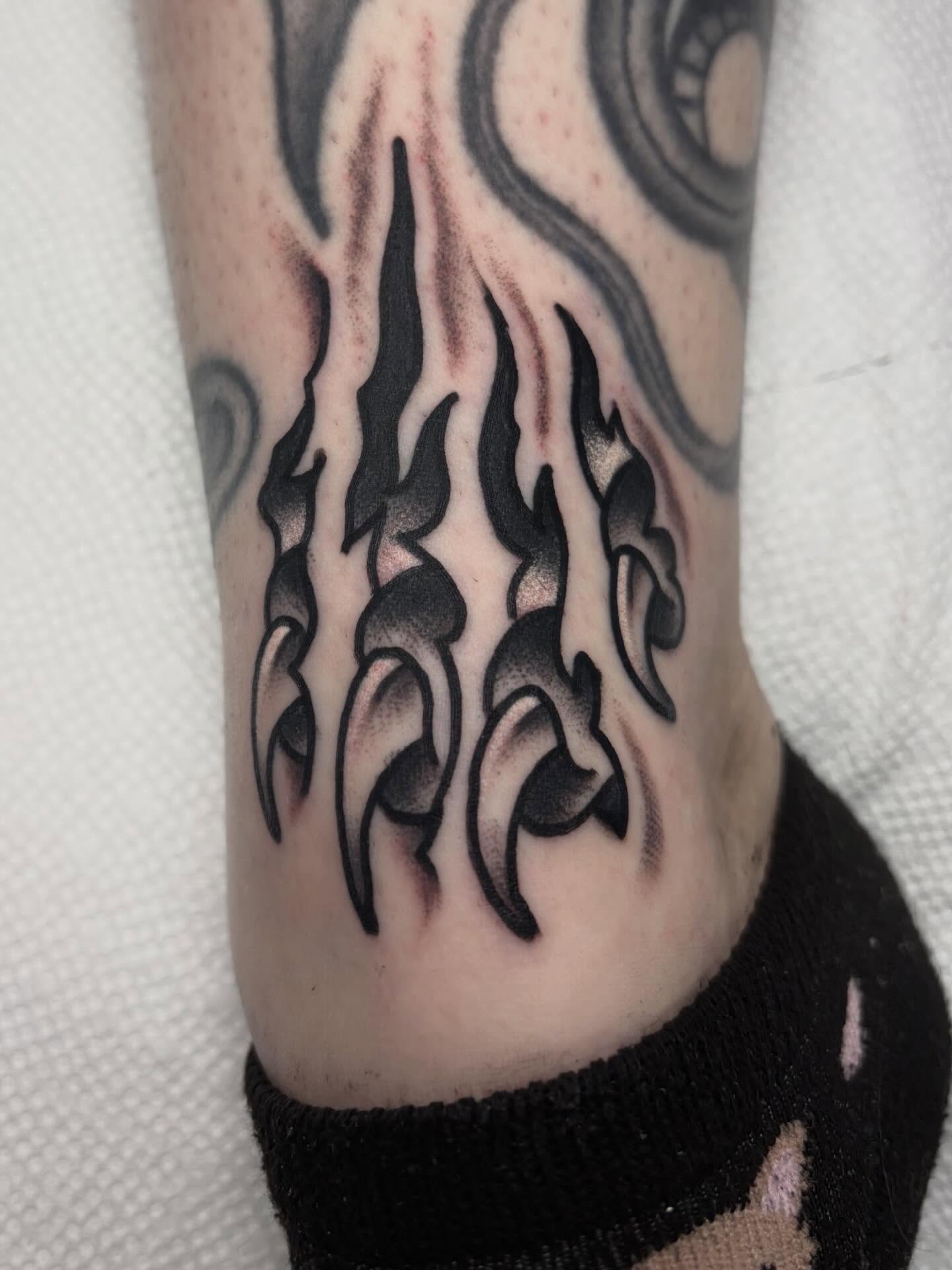 Flames black and grey tattoo on the forearm by David Armacost, Cincinnati, Ohio