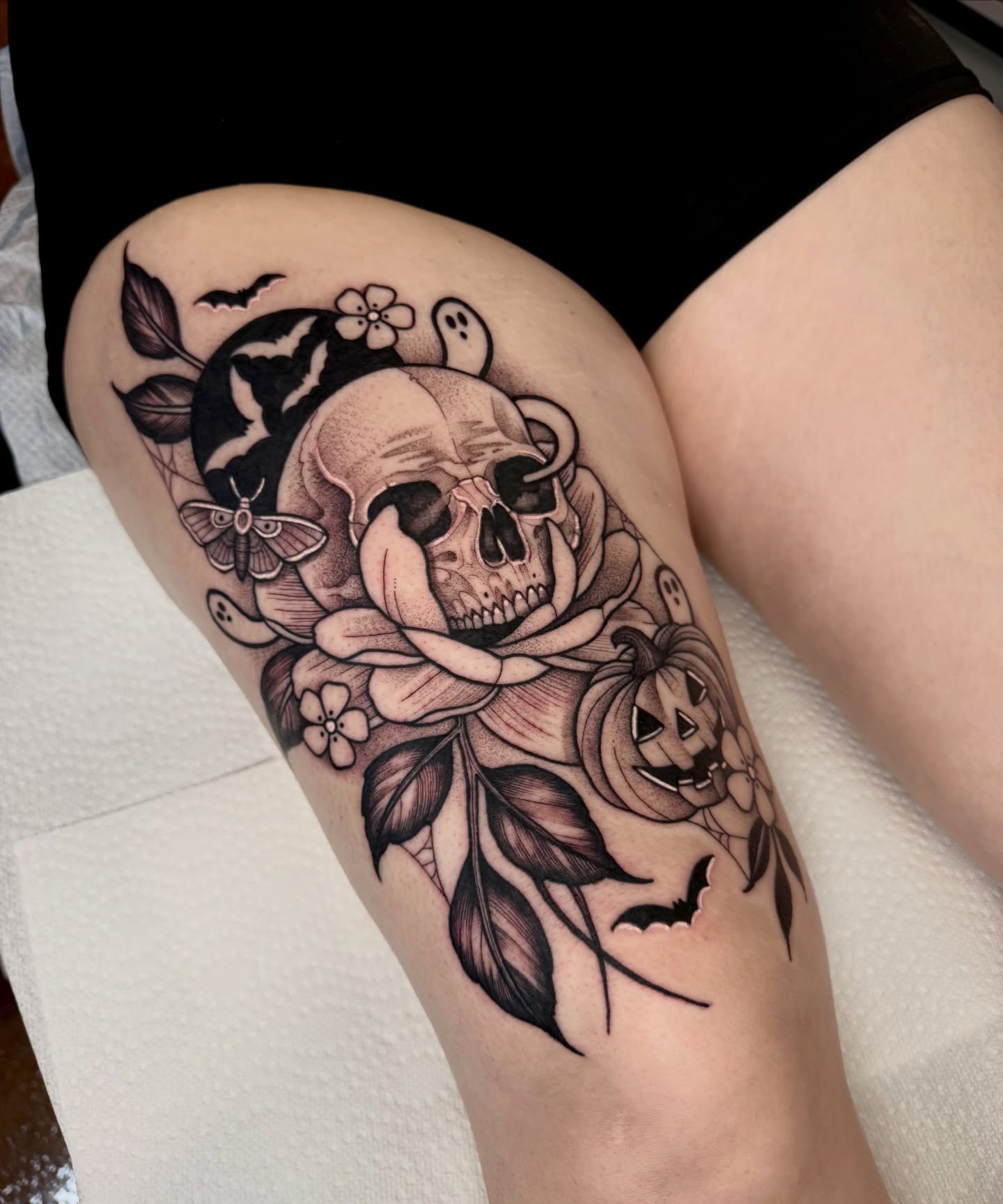 Skull and roses realism tattoo on the thigh by ⚡️ Krissy Fabis ⚡️