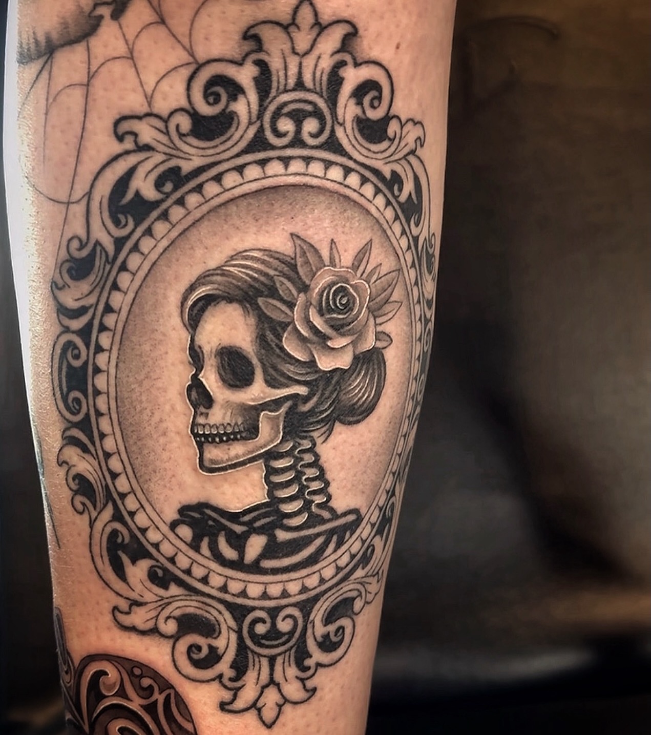 Skull with floral crown ornamental tattoo on the forearm by Elijah Forster - Nashville Tattoo Artist