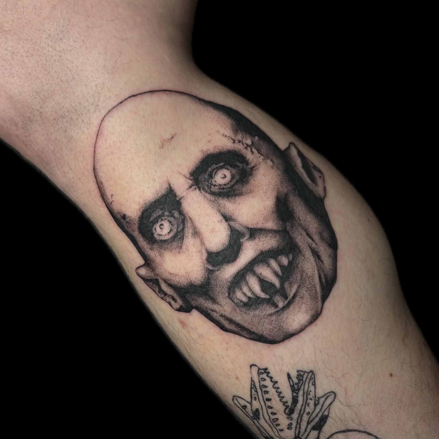 Horror face realism tattoo on the forearm by amy mangeri ๐ฆ