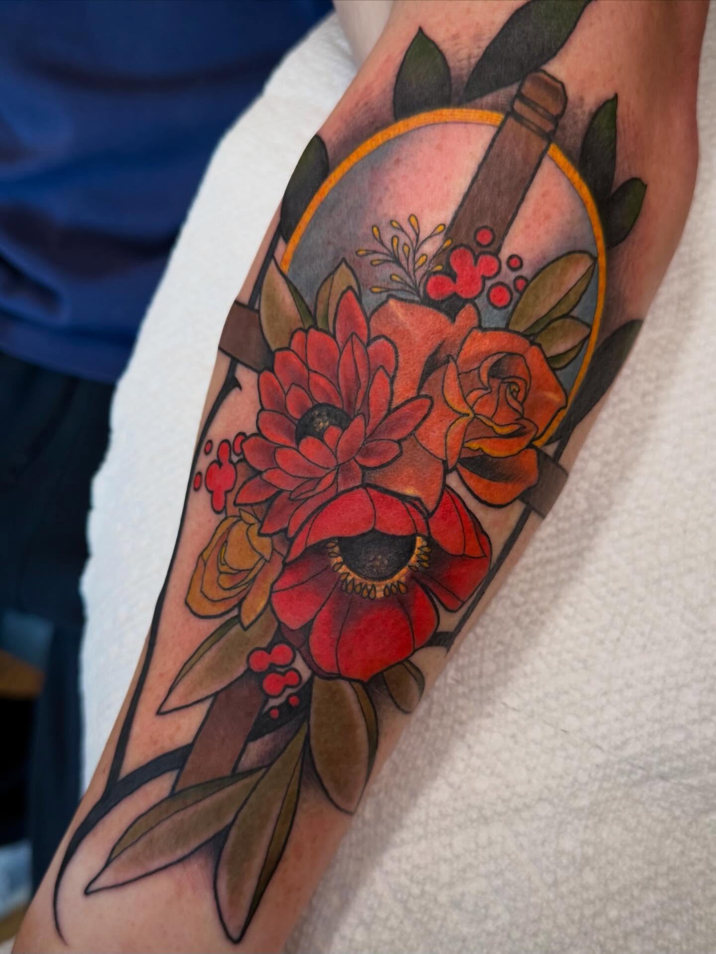 Floral bouquet American traditional tattoo on the forearm by Espinal
