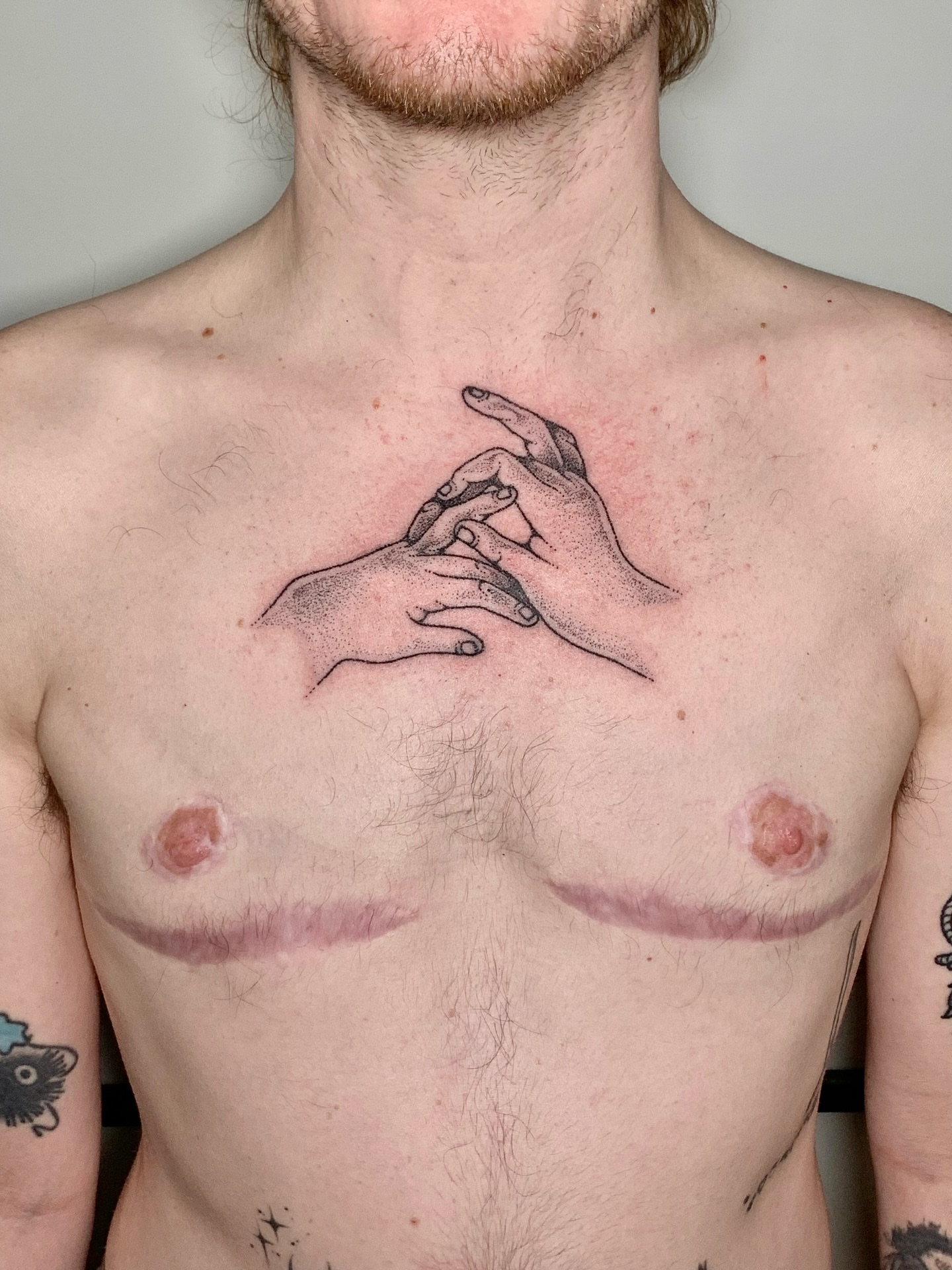 Hands black and grey tattoo on the chest by Lex Lloyd