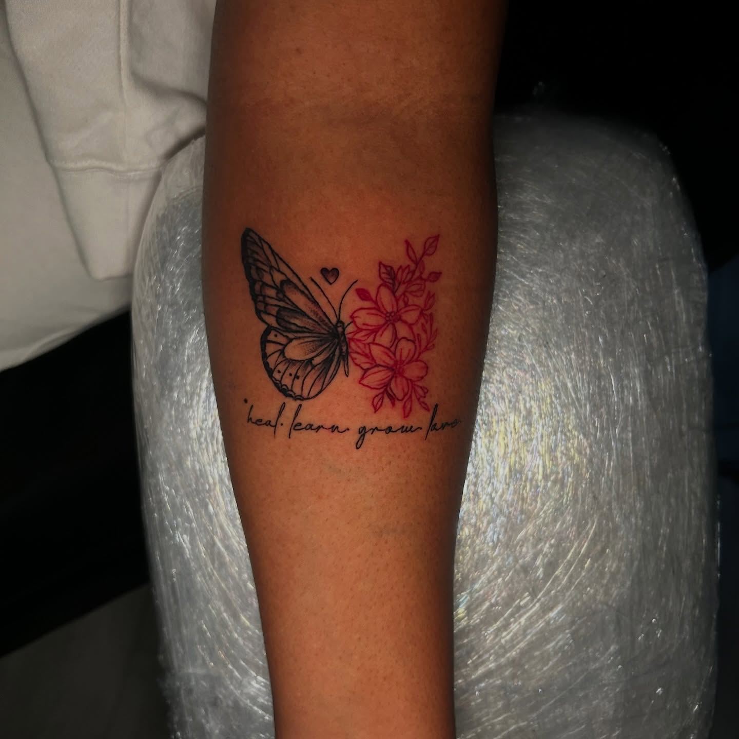 Butterfly and flowers dotwork tattoo on the forearm by Porshamonie' THE Tattoo ARTIST