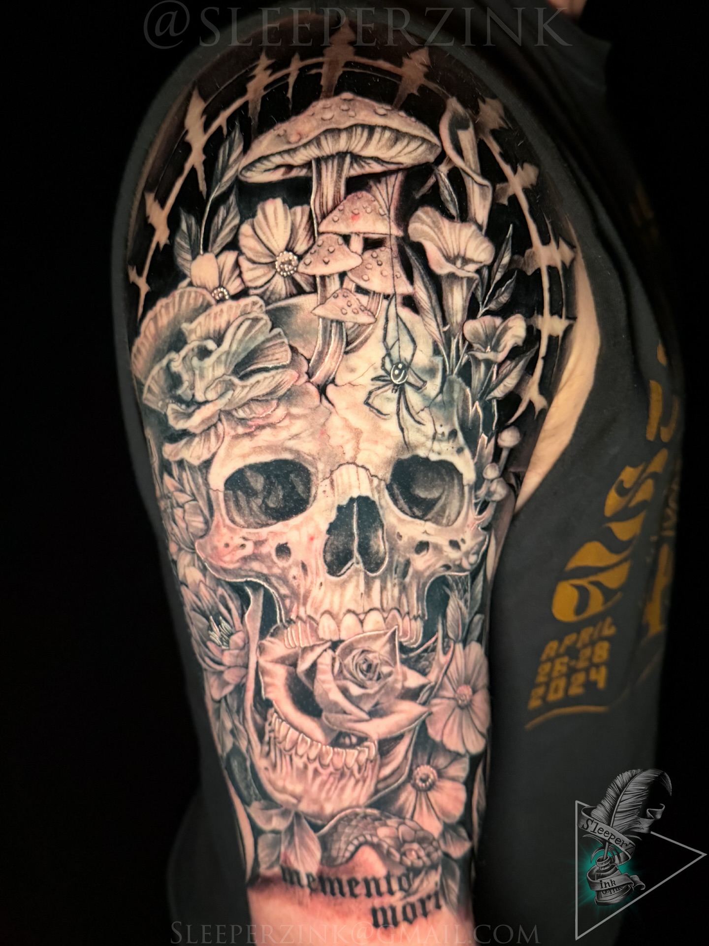 Skull and flowers realism tattoo on the forearm by Travis Sleeper