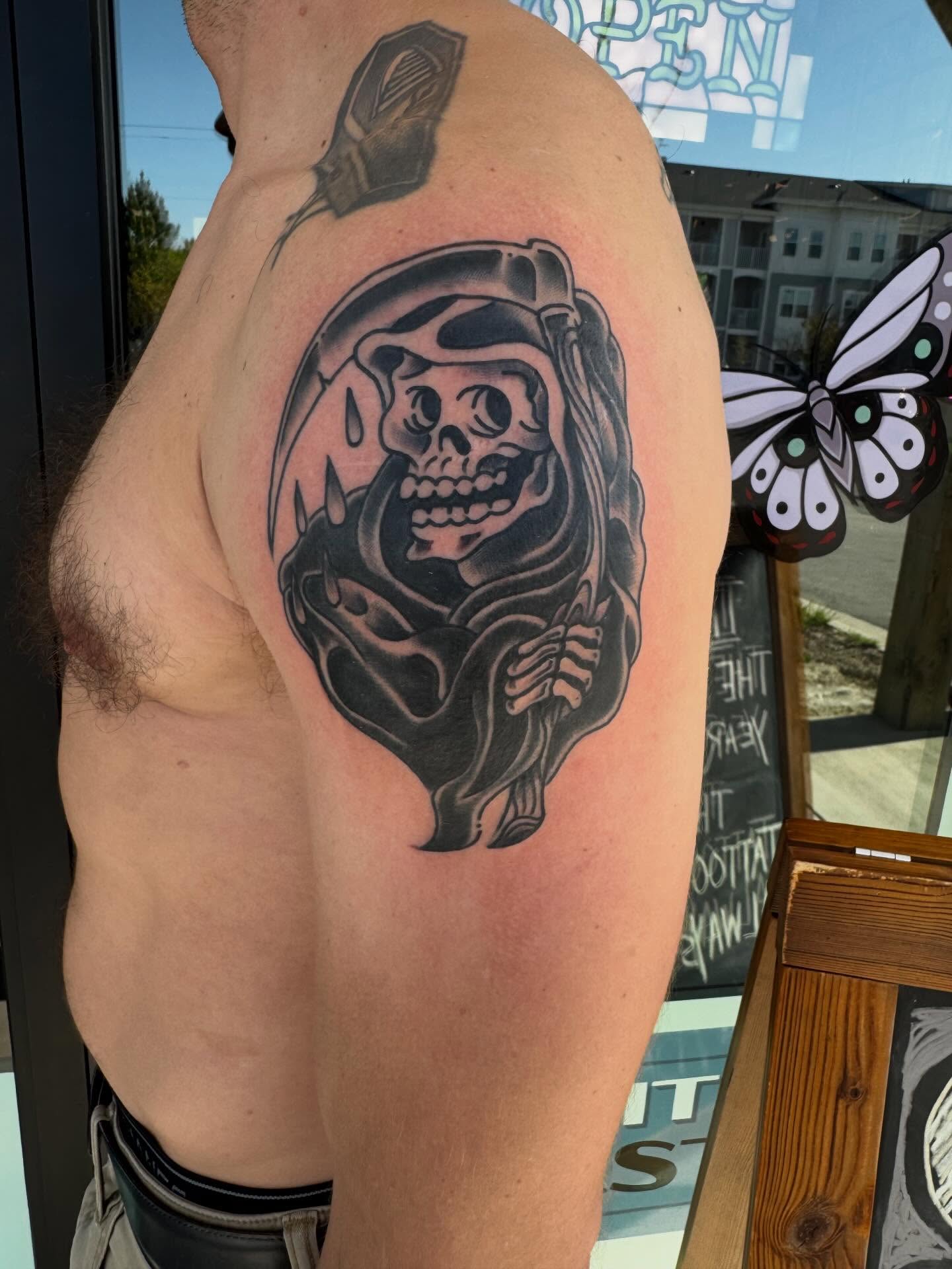 Grim reaper black and grey tattoo on the shoulder by j Smalley