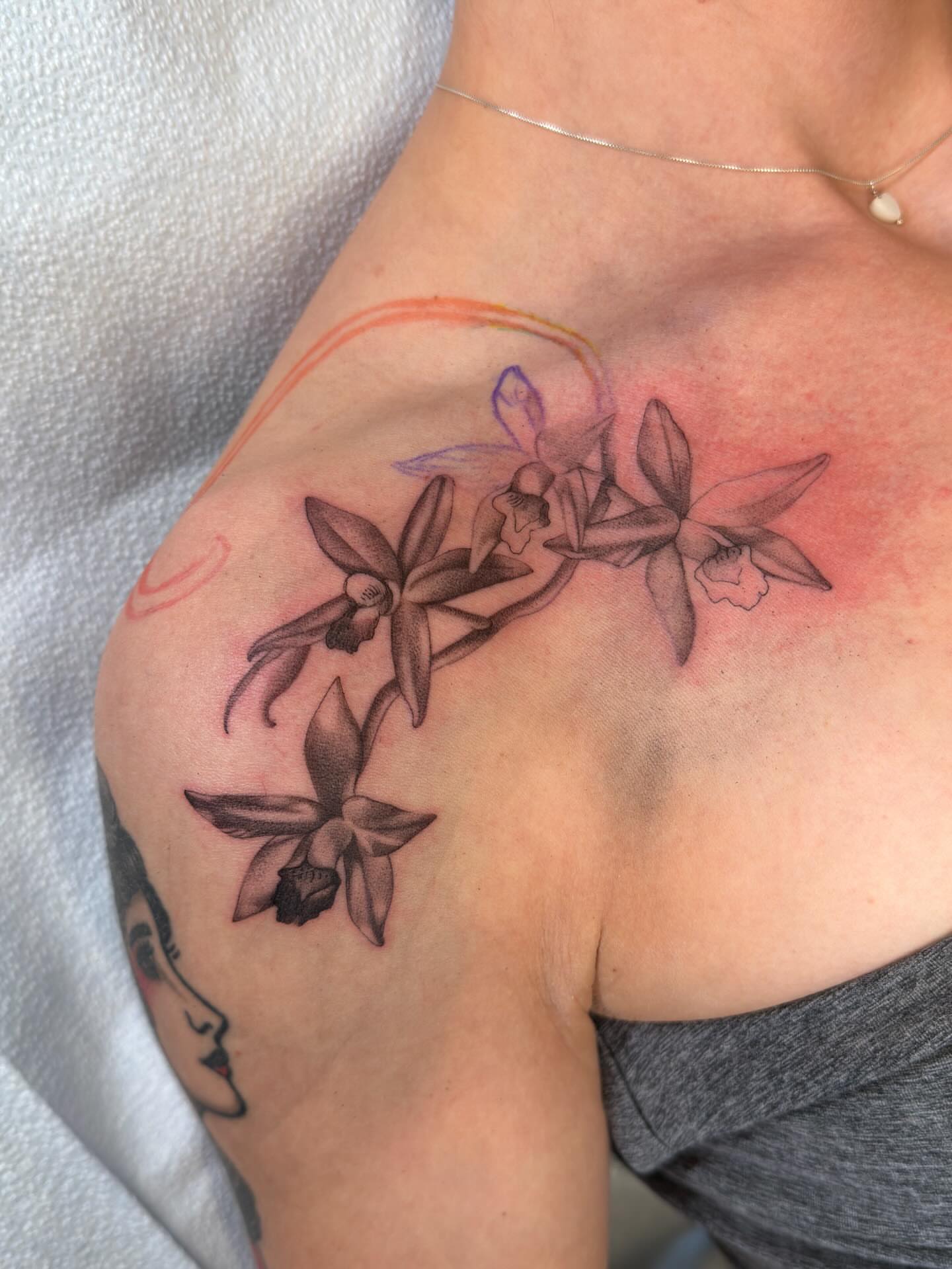 Orchids black and grey tattoo on the shoulder by Nayoung, San Francisco, California