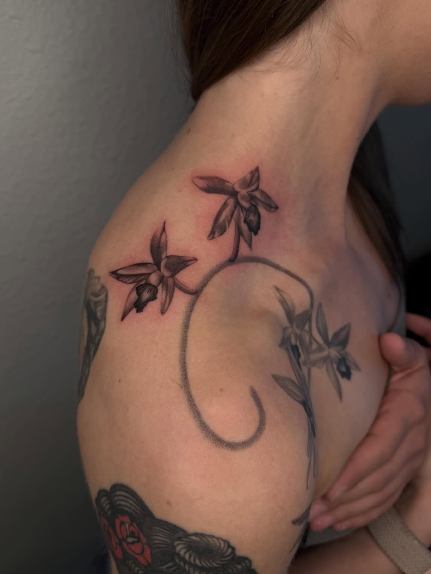 Orchids black and grey tattoo on the shoulder by Nayoung, San Francisco, California