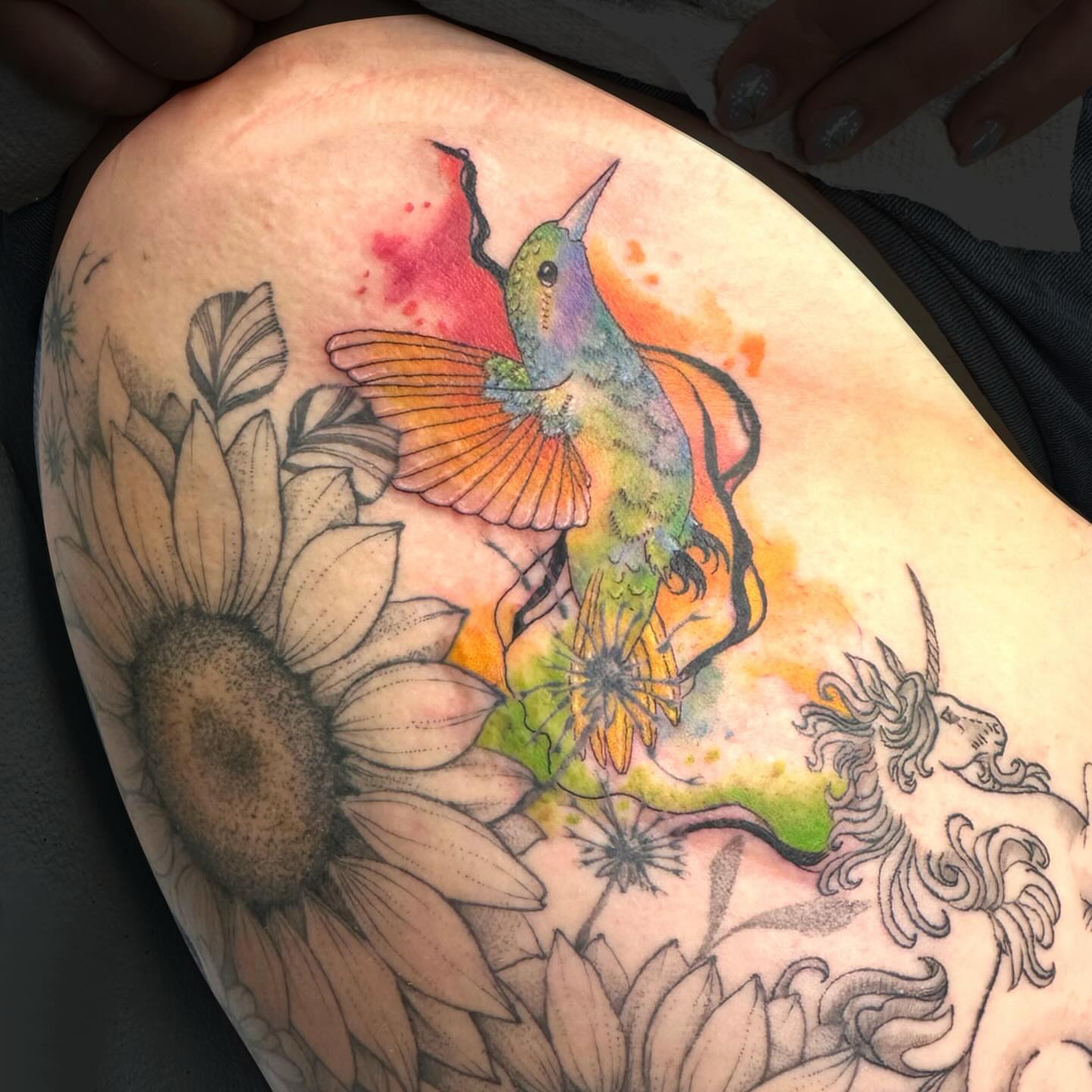 Hummingbird and sunflowers watercolor tattoo on the thigh by 🌜🔮✨Anya Casey✨🔮🌛