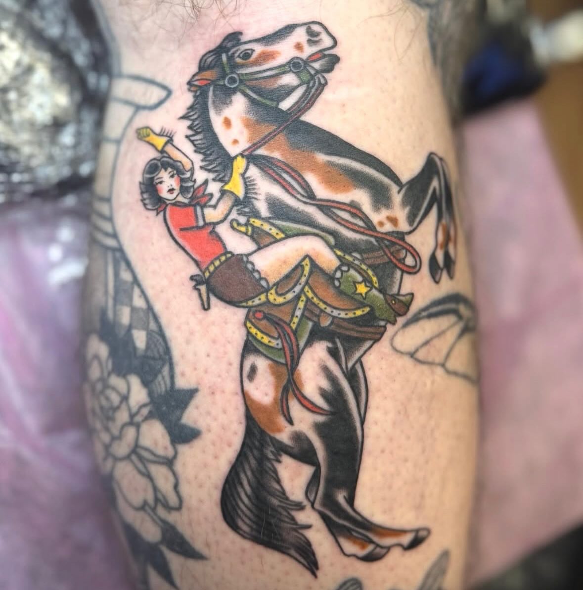 Cowgirl riding horse American traditional tattoo on the forearm by Anna