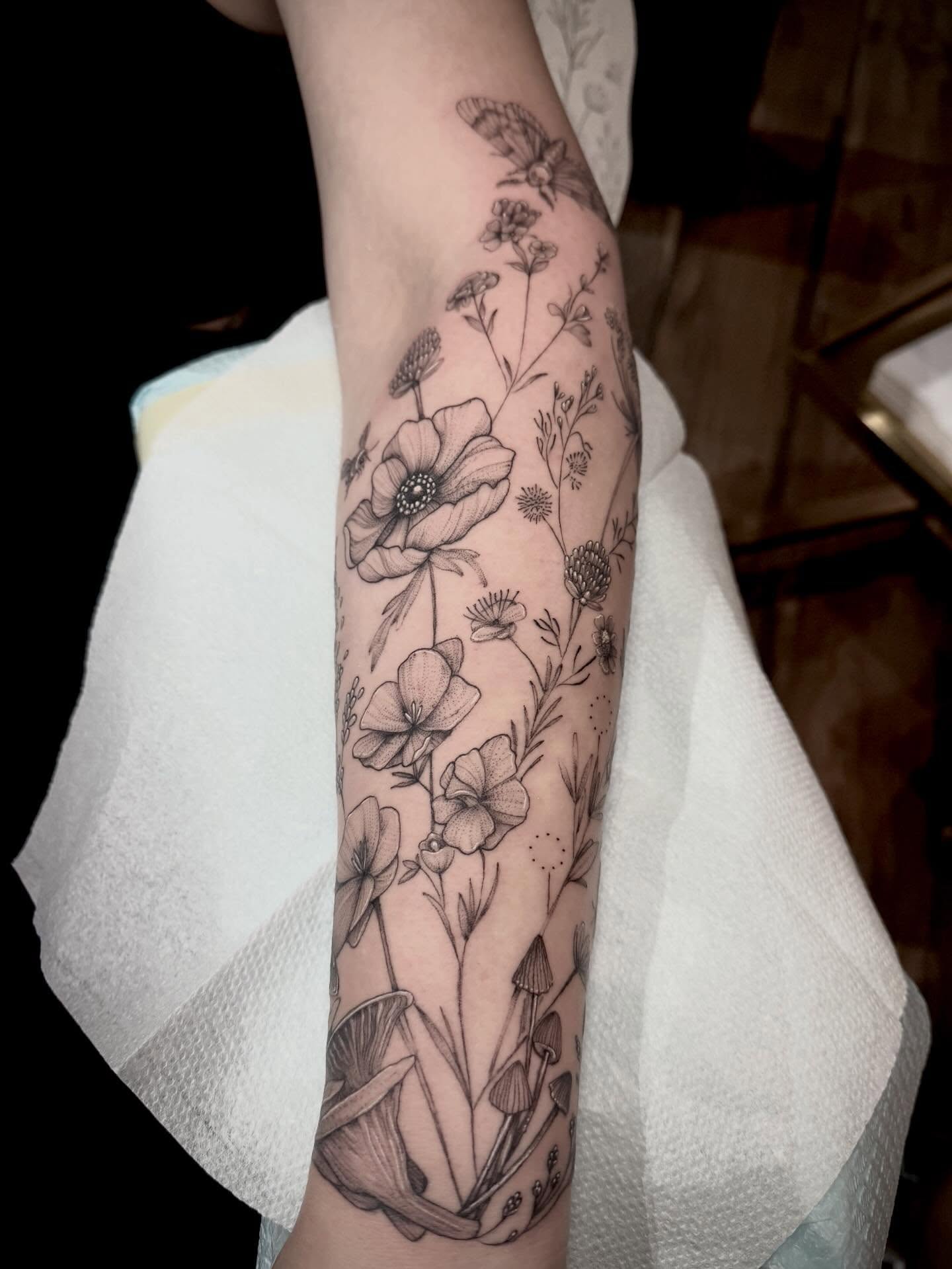 Floral bouquet realism tattoo on the forearm by Tattoos by Robyn Pallotta, Austin, Texas
