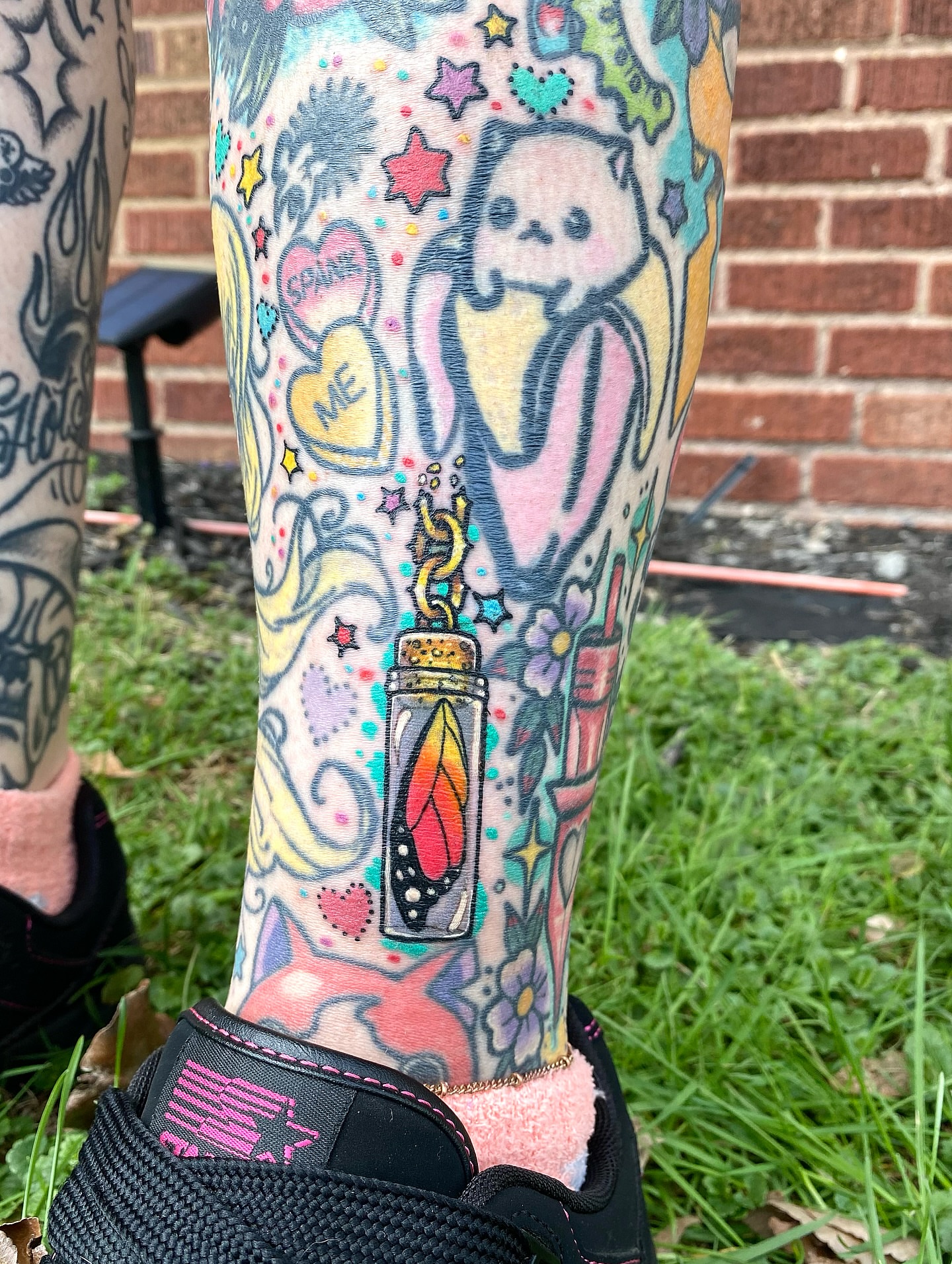 Butterfly in jar dotwork tattoo on the forearm by Sheila Asbury 💲