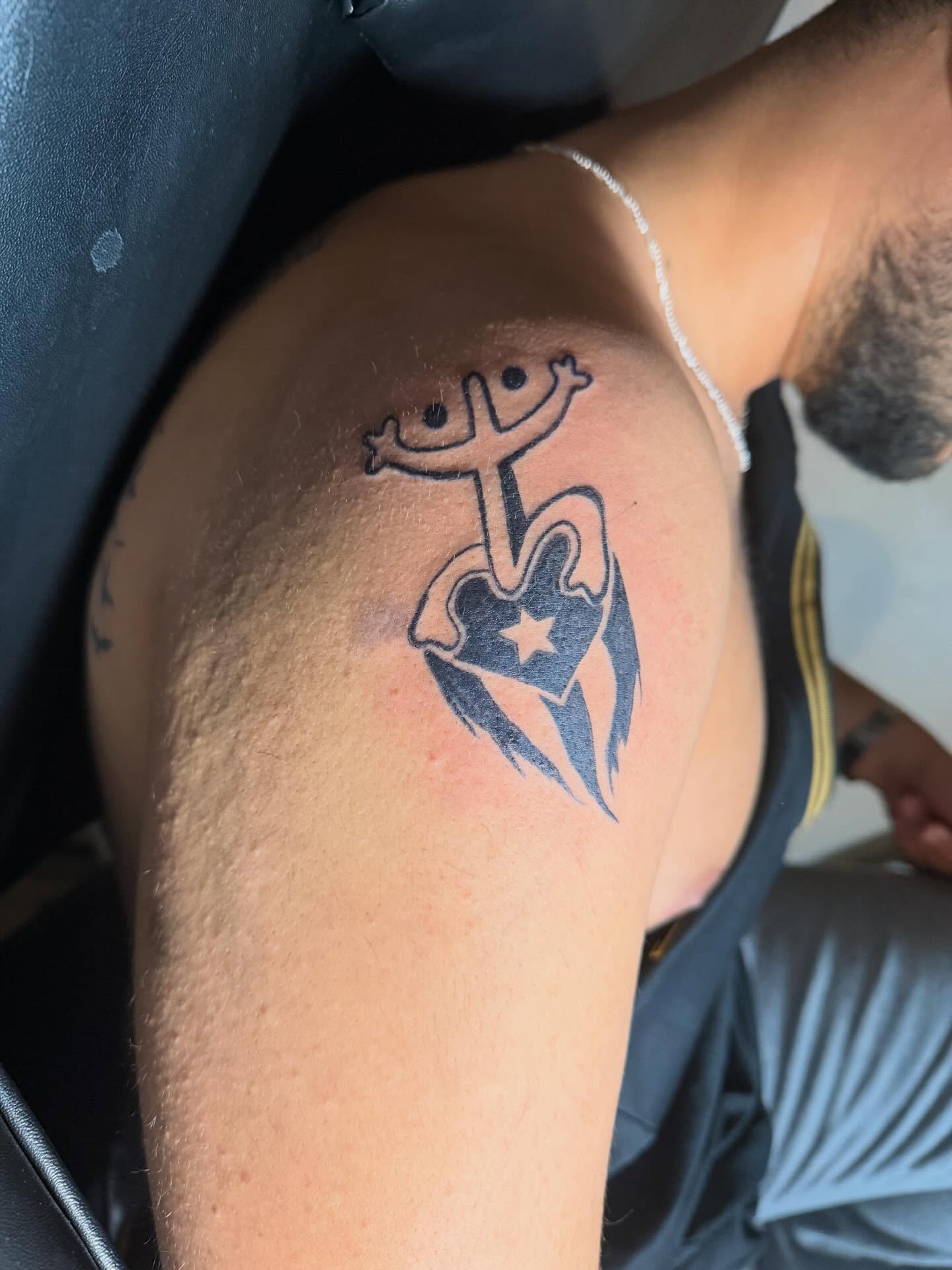 Heart with cross and star tribal tattoo on the shoulder by @bloodline__legacy