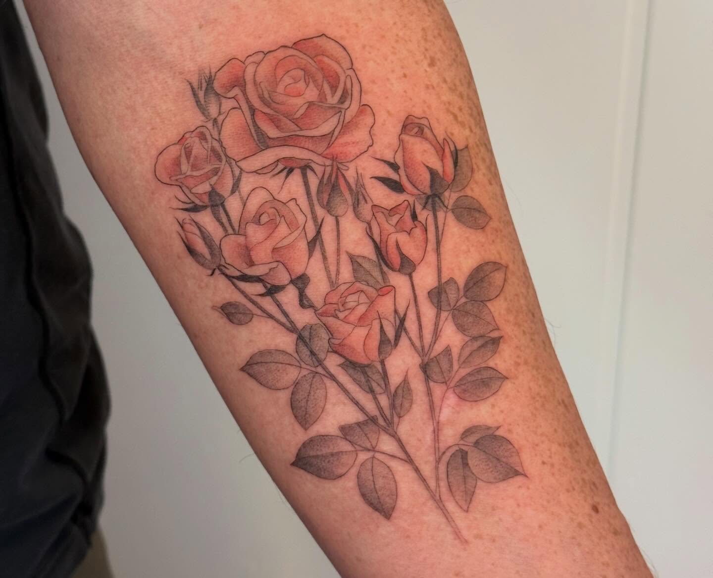 Roses realism tattoo on the forearm by Justin Turkus