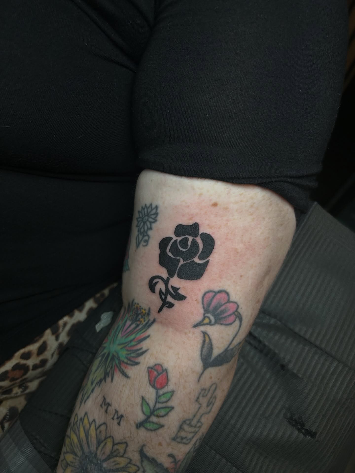 Rose black and grey tattoo on the forearm by Torrey, Austin, Texas