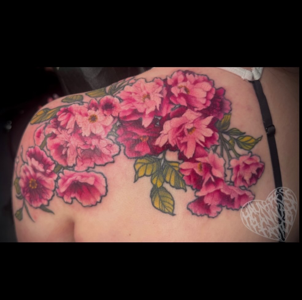 Cherry blossoms realism tattoo on the shoulder by Hannah Casadonti
