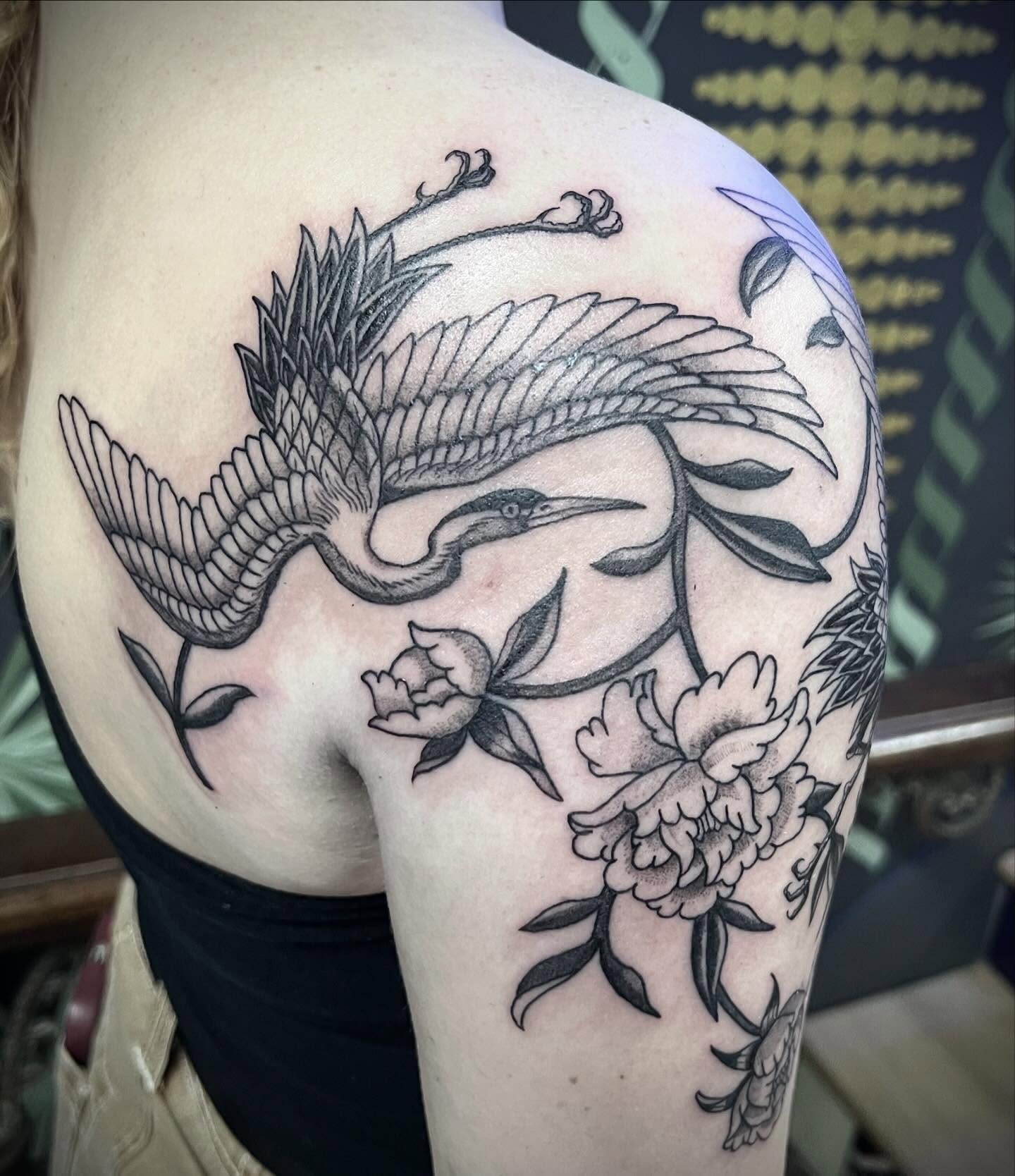 Bird and flowers black and grey tattoo on the shoulder by Natalie Phillips, Oakland, California