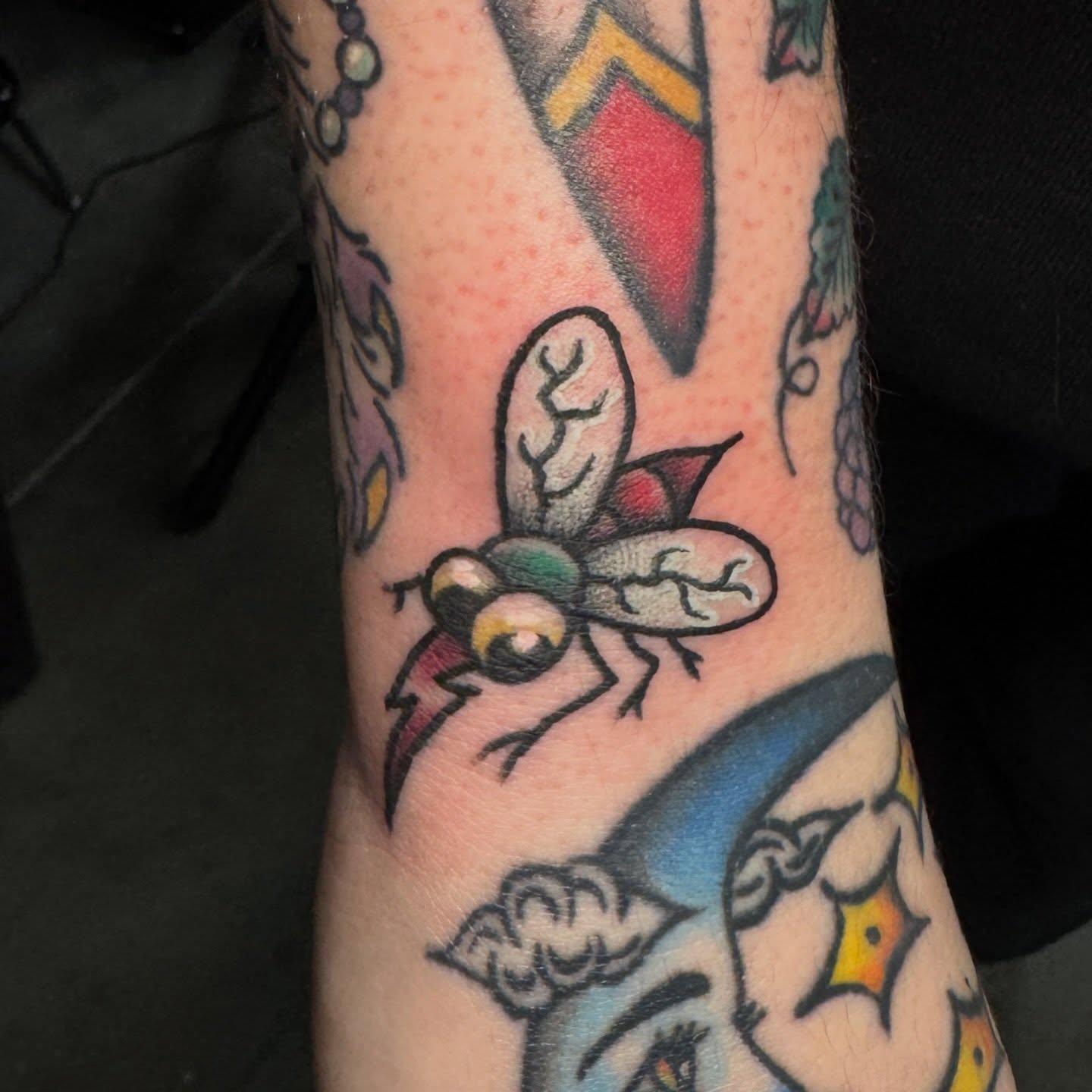 Mosquito American traditional tattoo on the forearm by Seth Christianson
