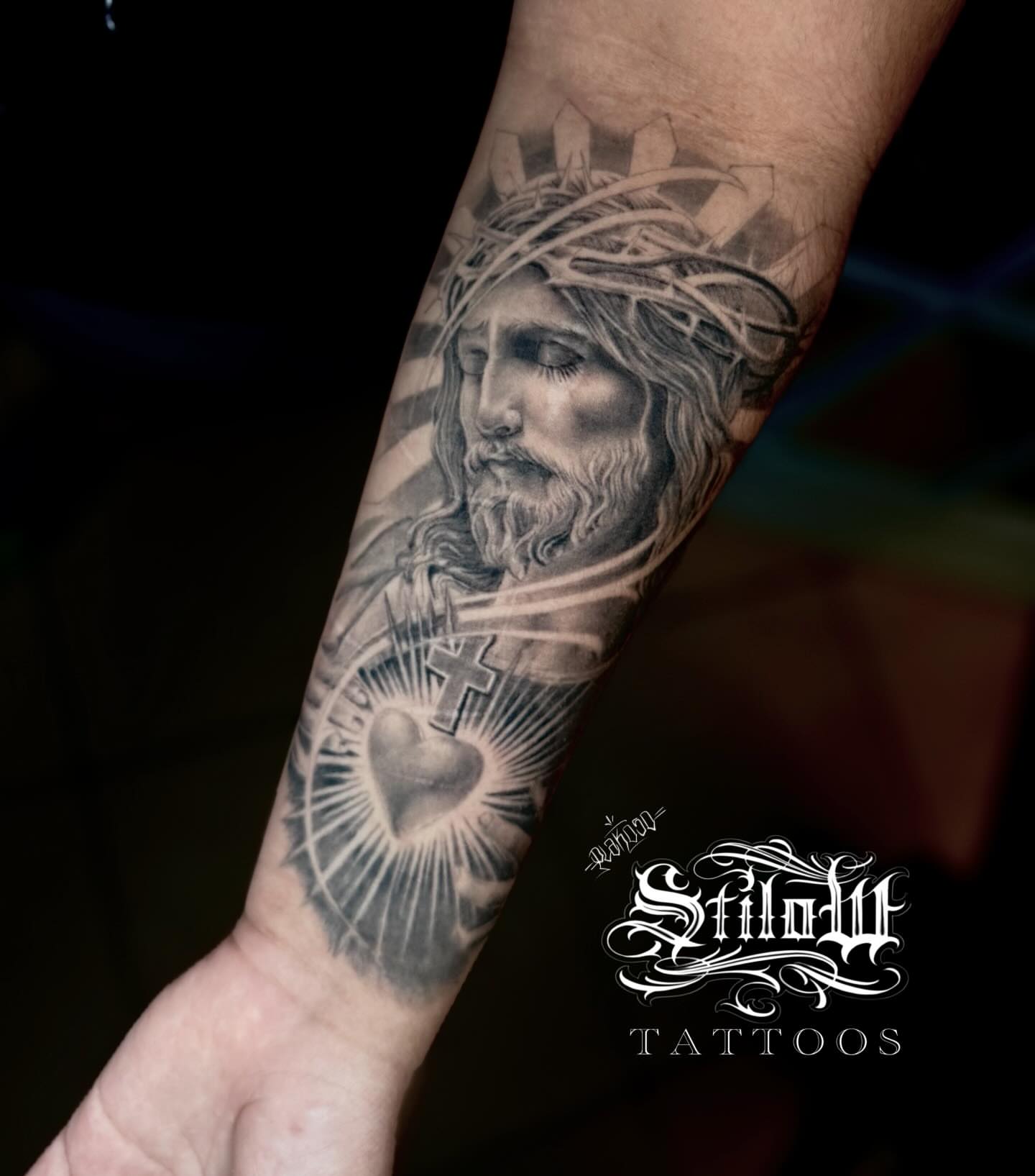 Religious figure realism tattoo on the forearm by Stilow Memphis Tattoo Artist, Memphis, Tennessee