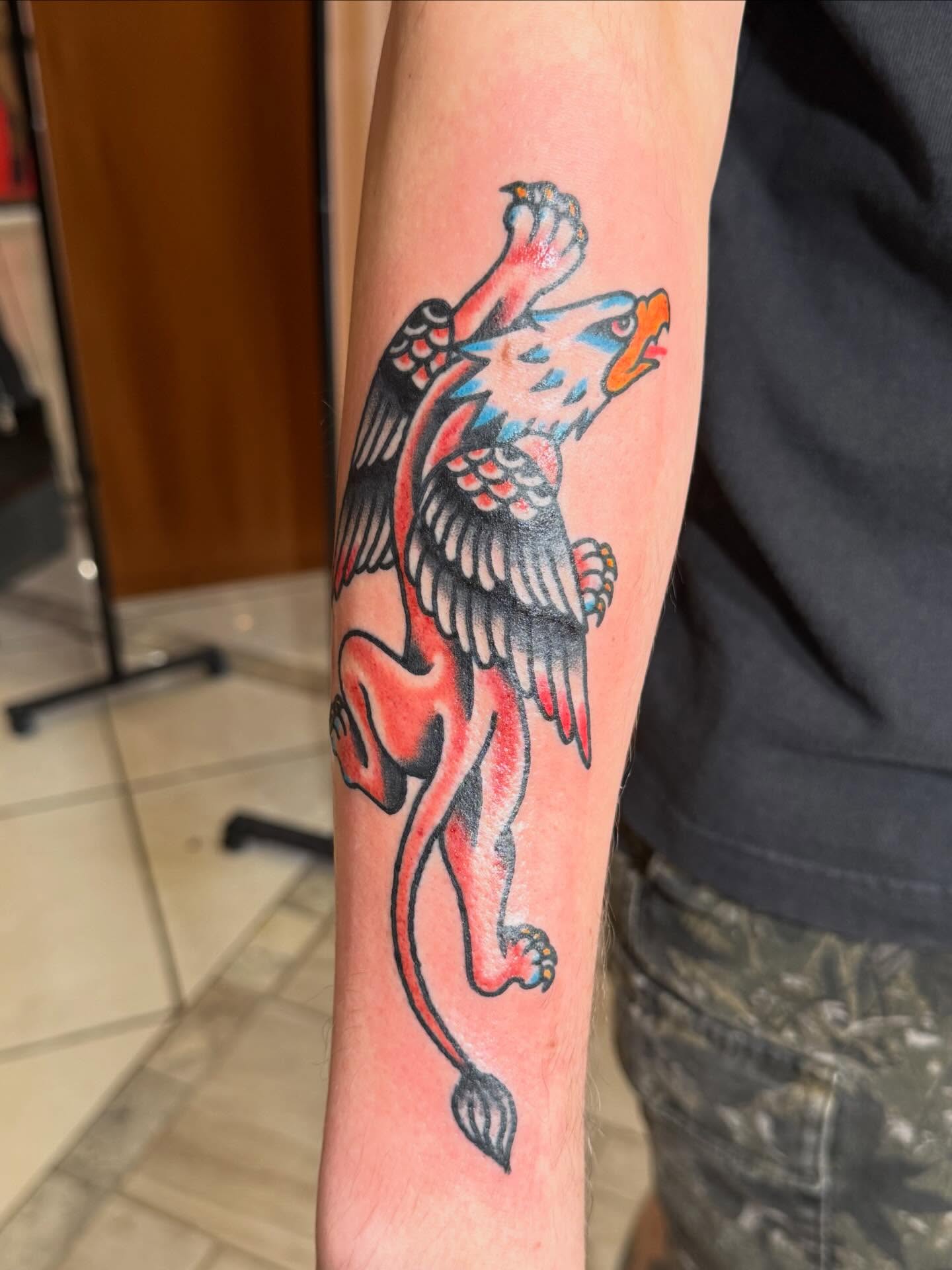 Lion American traditional tattoo on the forearm by Bill Crawford, Plymouth, Michigan