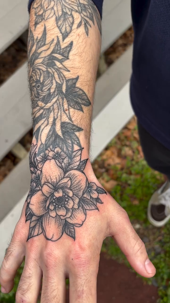 Floral hand and forearm tattoo ornamental tattoo on the forearm by Rose DeLisse