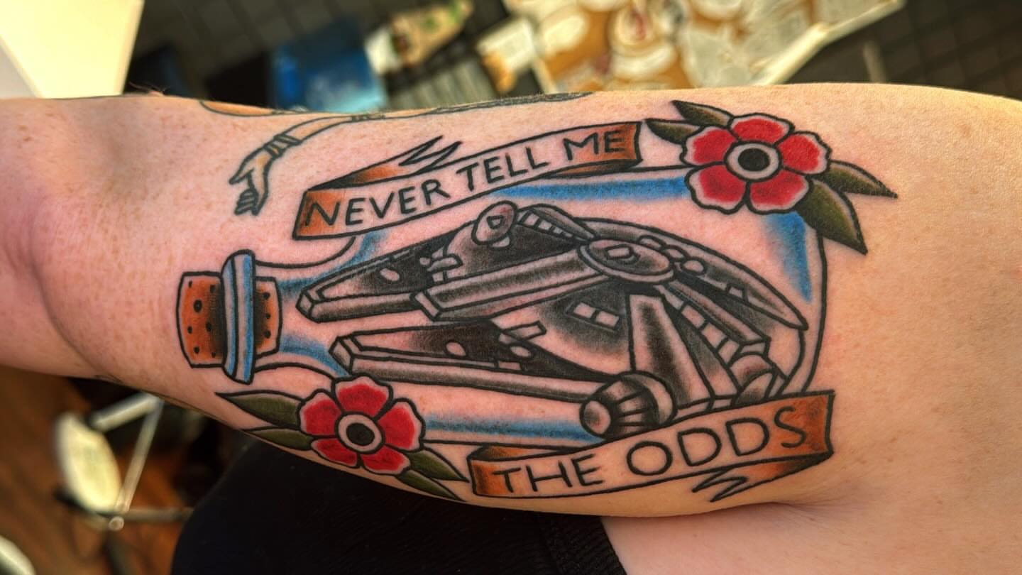 Pinball machine American traditional tattoo on the forearm by Zach Eden