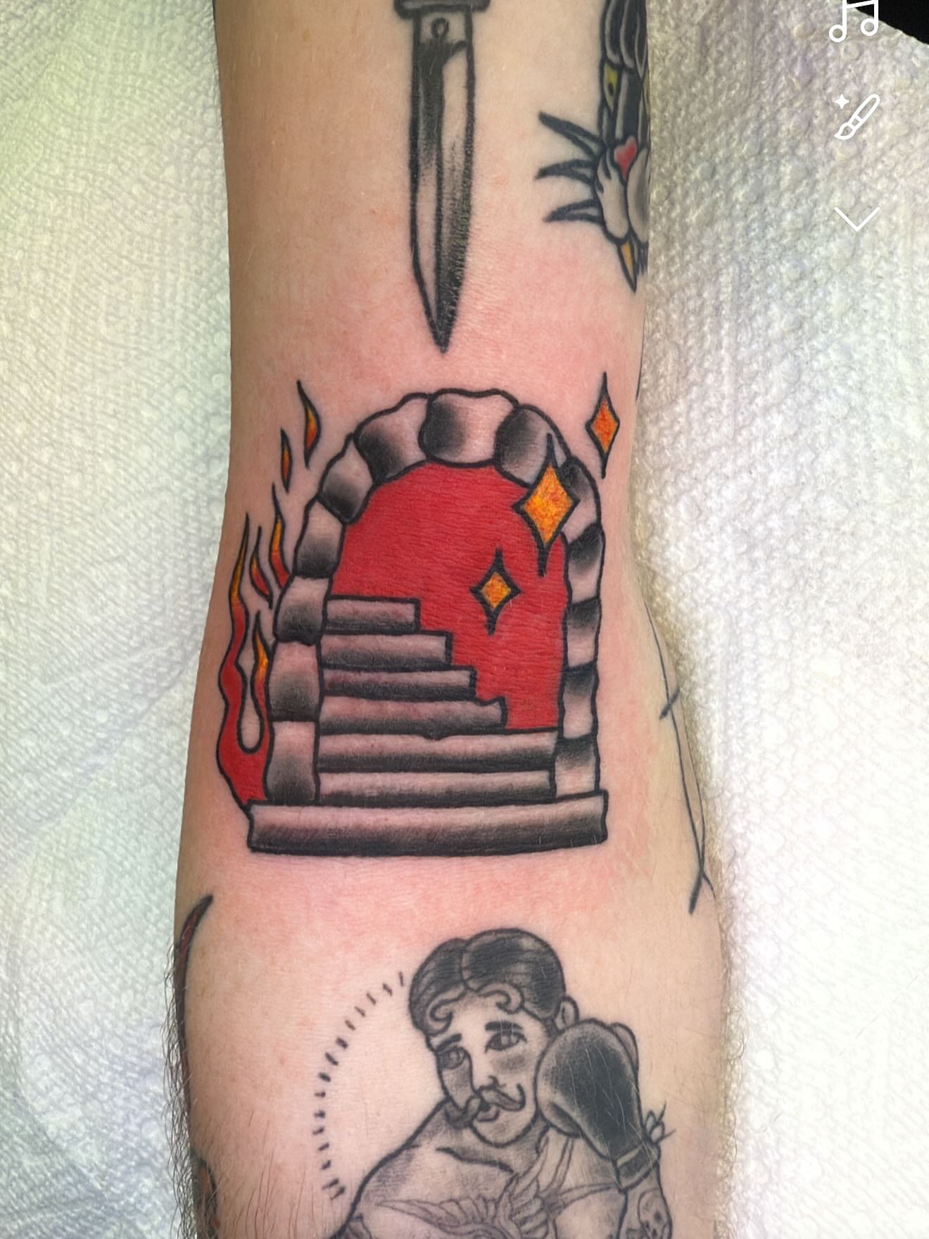 Staircase with portal American traditional tattoo on the forearm by Zach Eden