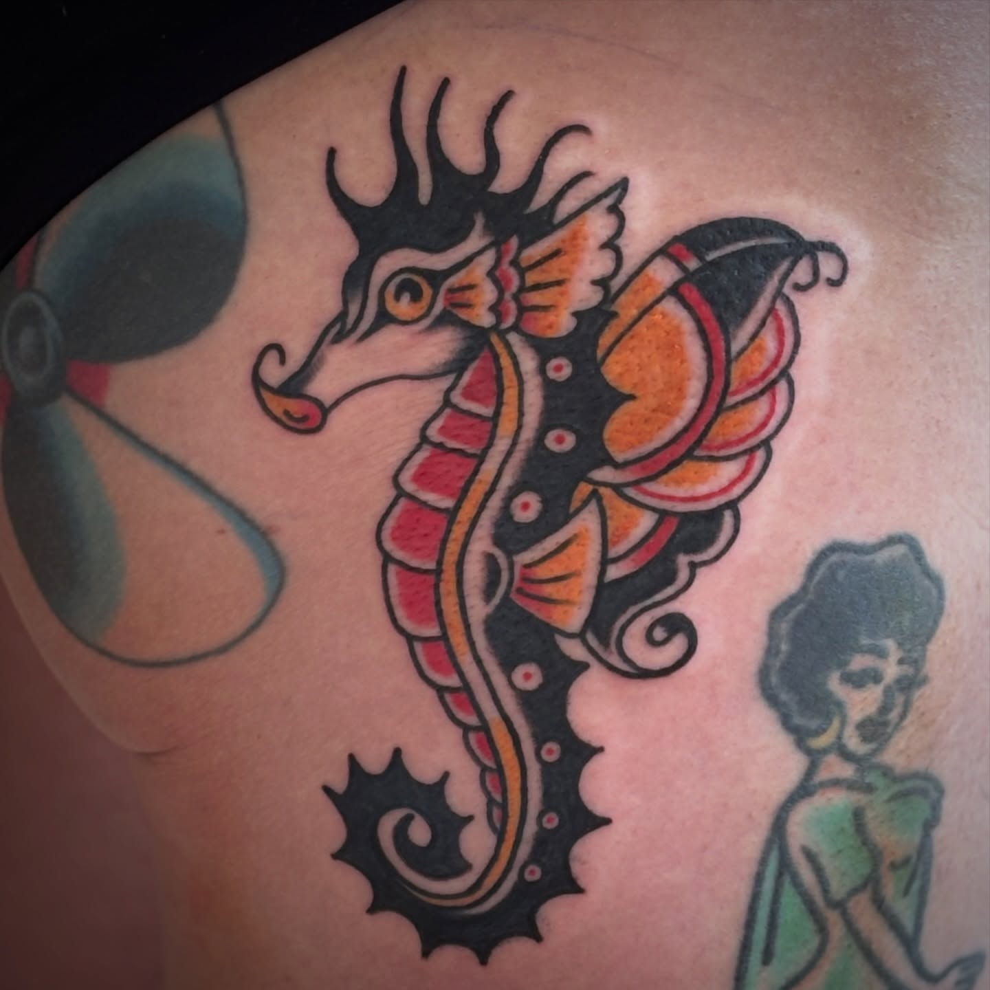 Seahorse American traditional tattoo on the shoulder by Malachi
