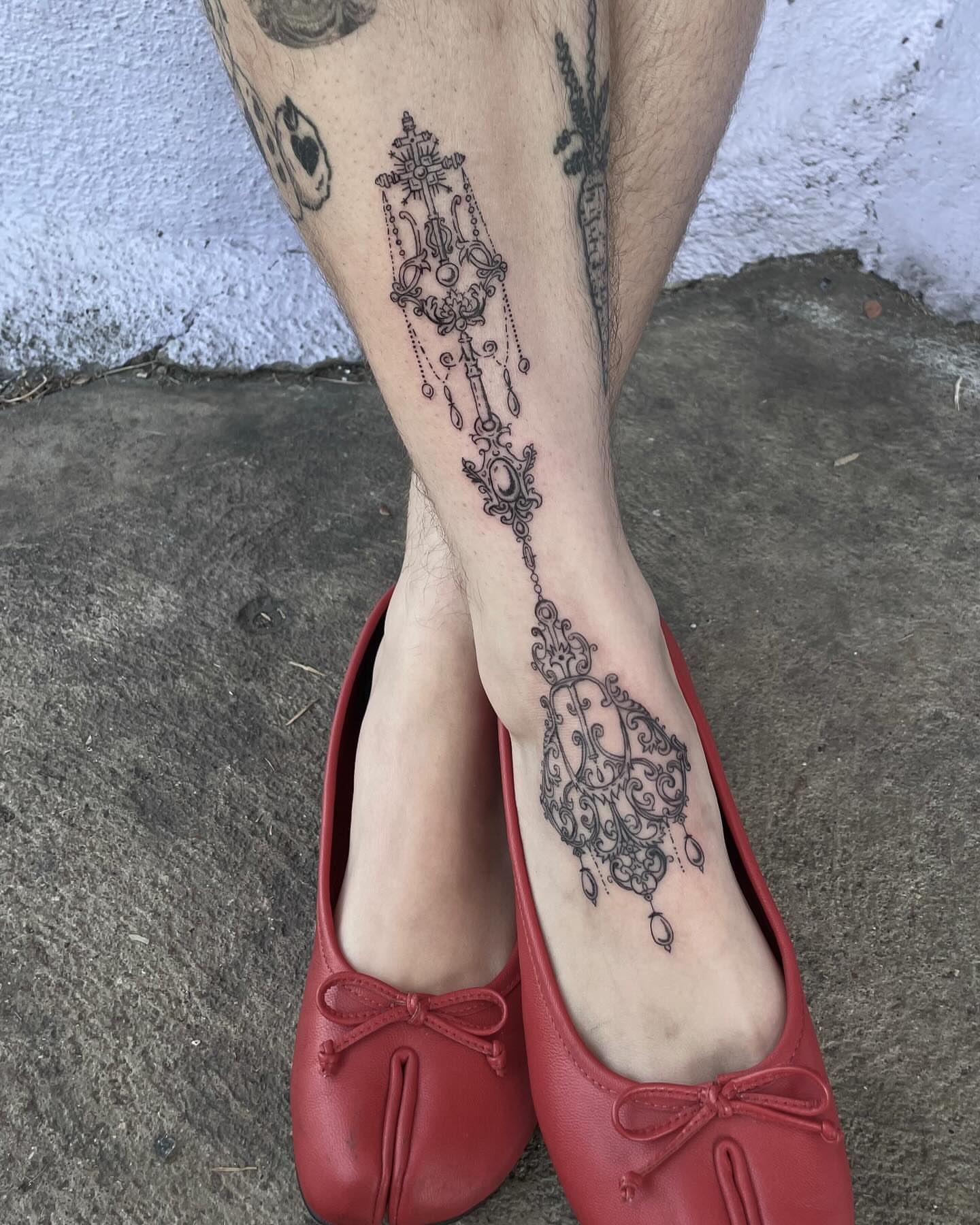 Chandelier ornamental tattoo on the calf by Sophia Tattoo