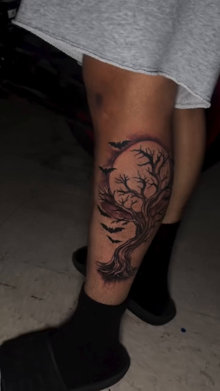 Spooky tree with moon and bats dark realism tattoo by Dope
