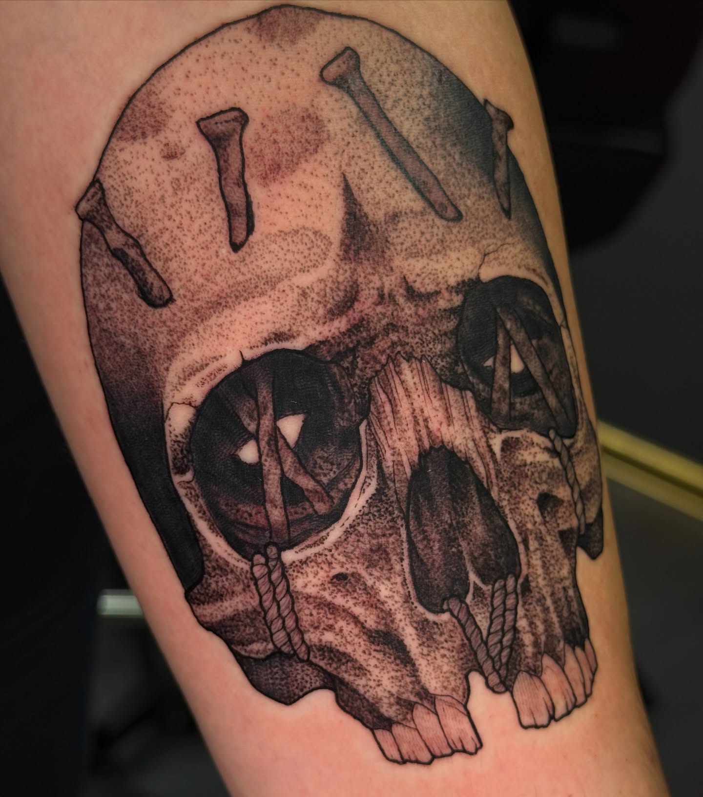 Skull dotwork tattoo on the forearm by Erin Morbid