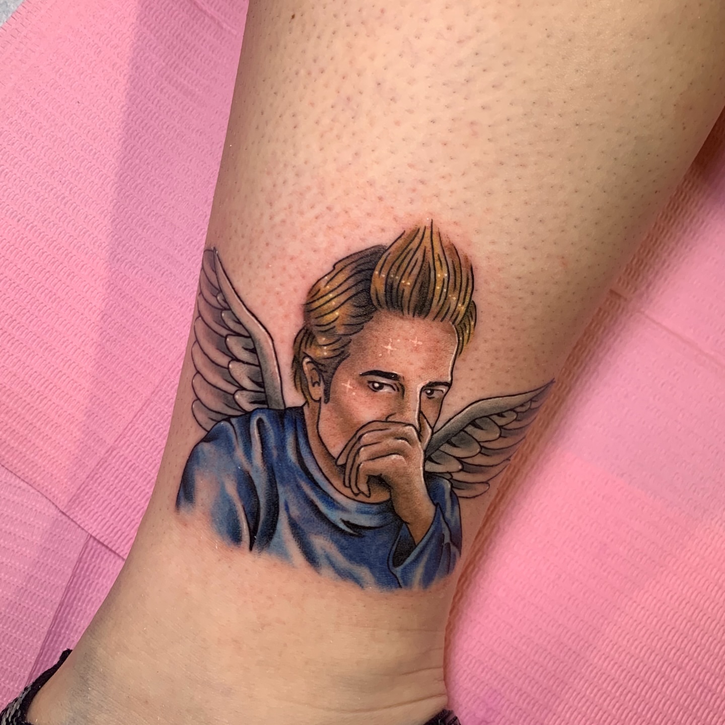 Angel realism tattoo on the forearm by Aubrianna Grisez
