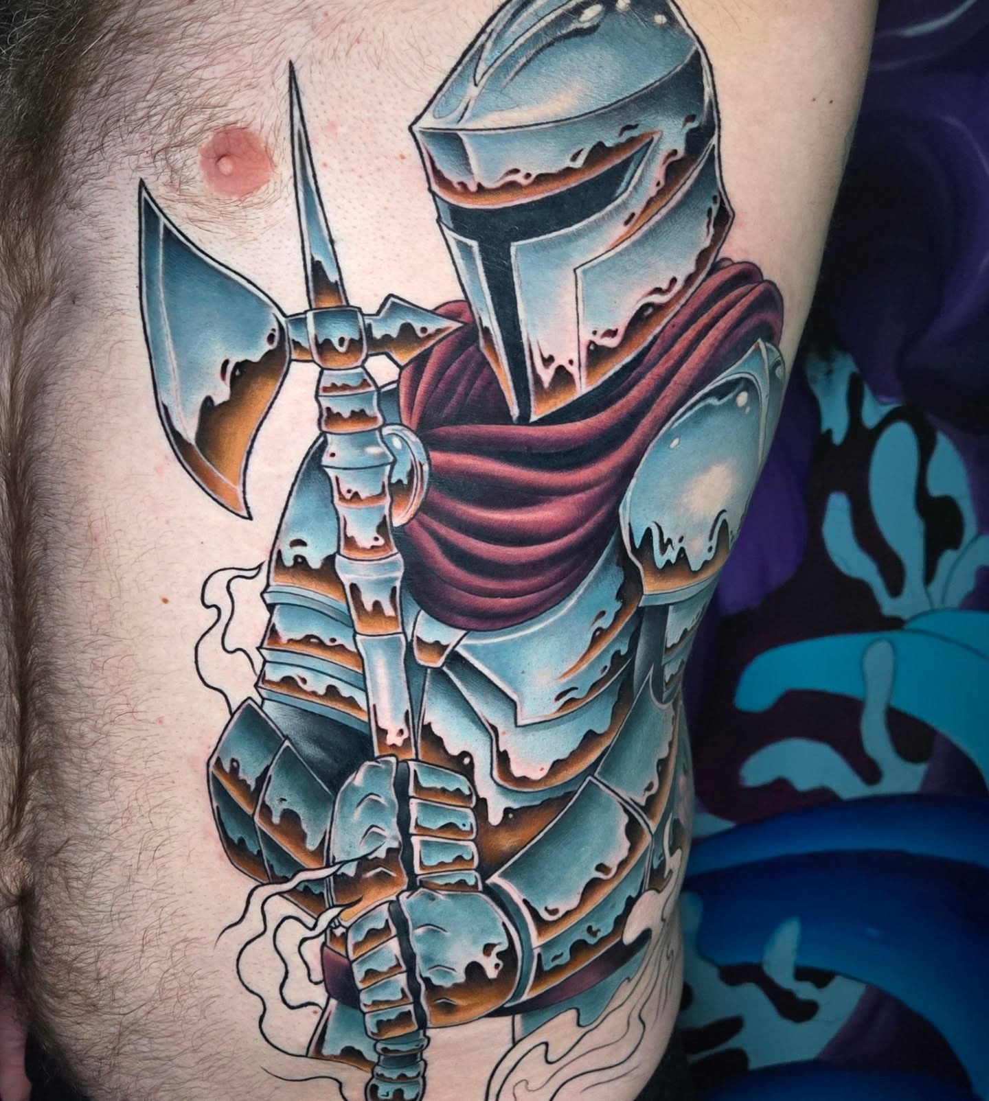 Mandalorian armor American traditional tattoo on the thigh by Jeff Stager