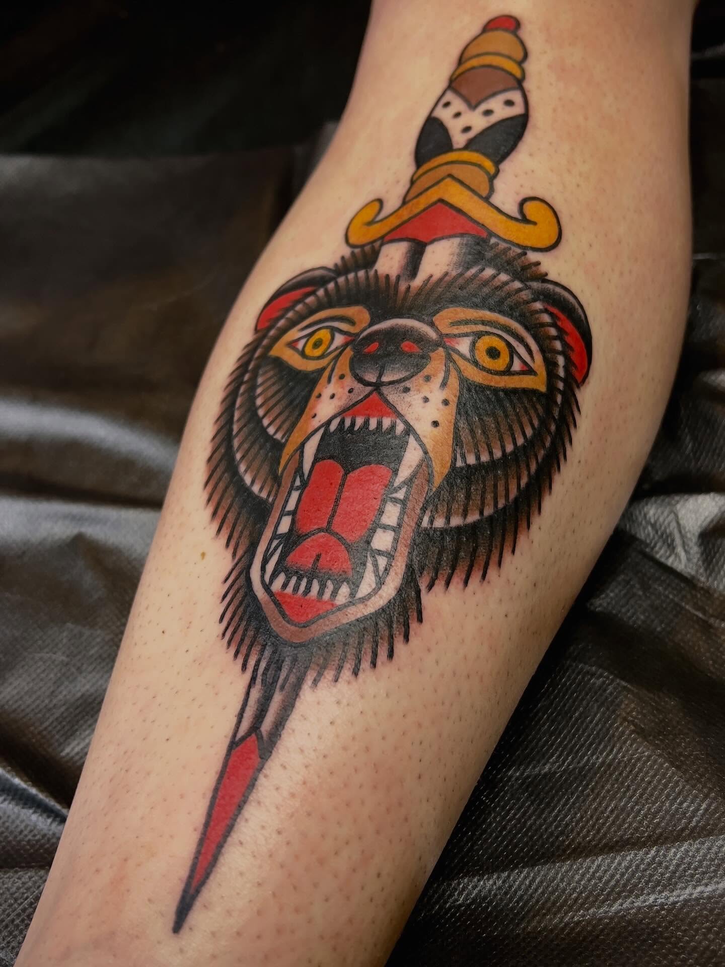 Bear head with dagger American traditional tattoo on the forearm by ReadyFreddie_tattoo