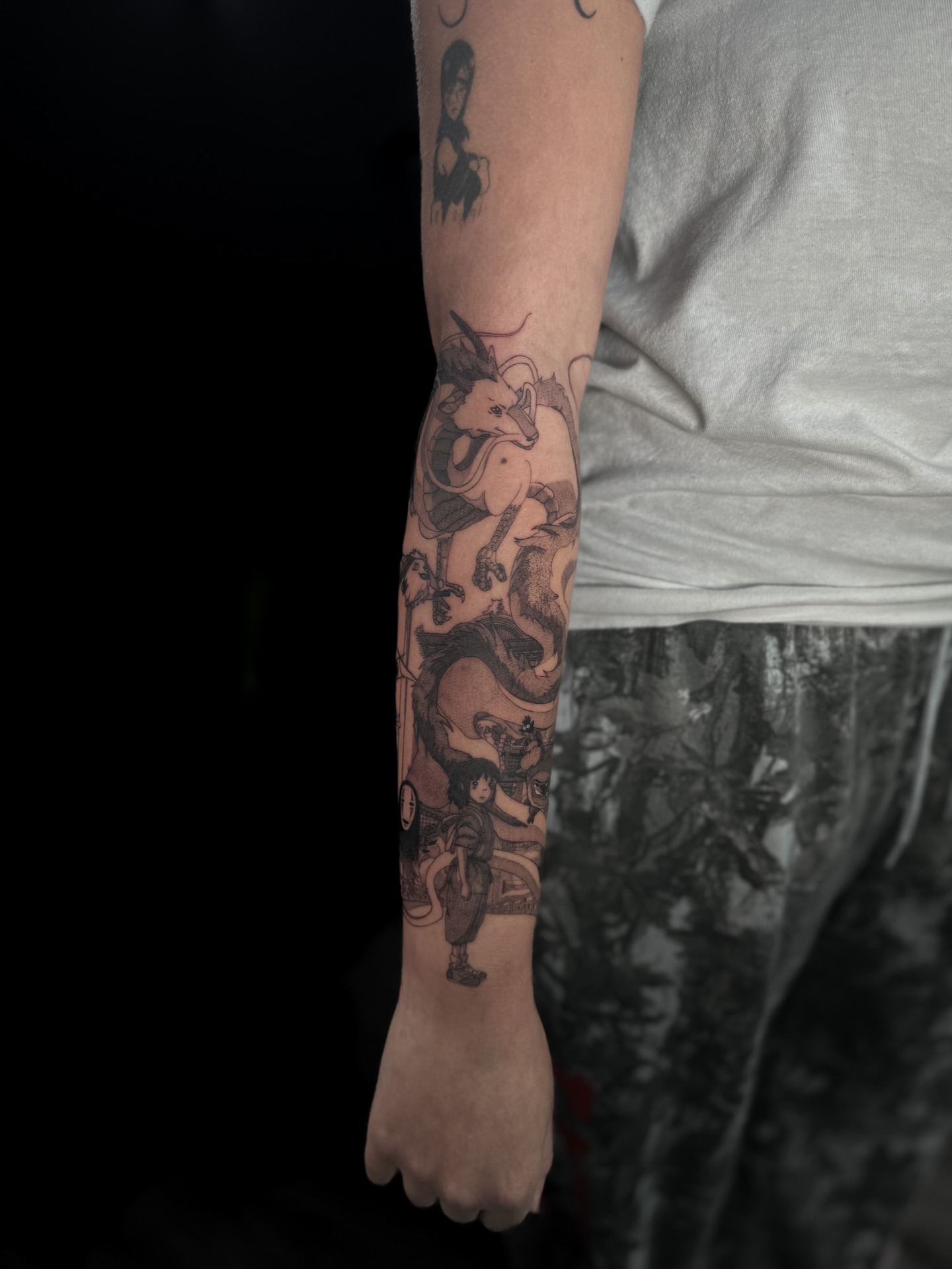 Dragon and woman anime tattoo on the forearm by Elijah Cosme, Miami, Florida
