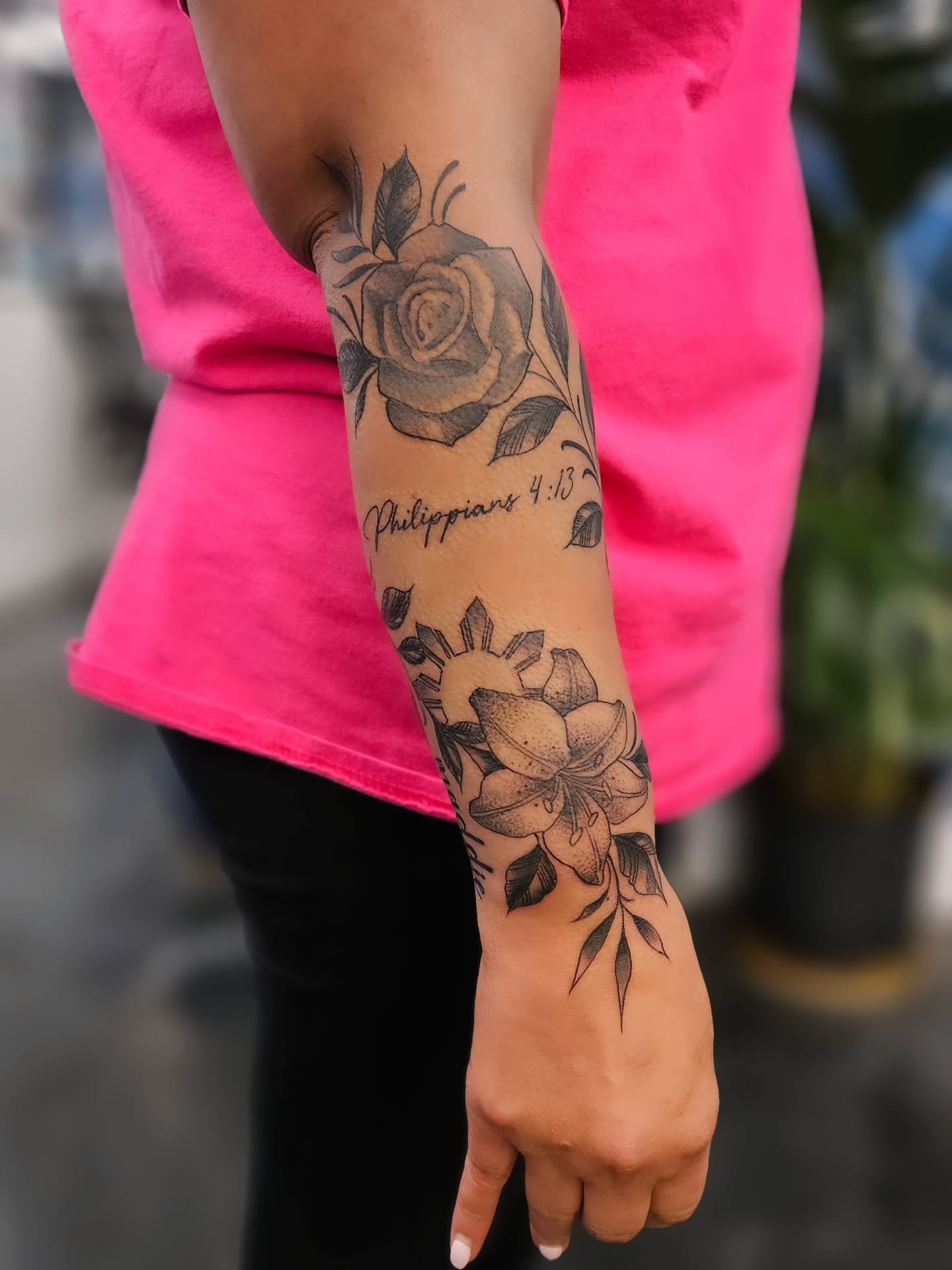 Rose and lotus black and grey tattoo on the forearm by Jo'el Acoba