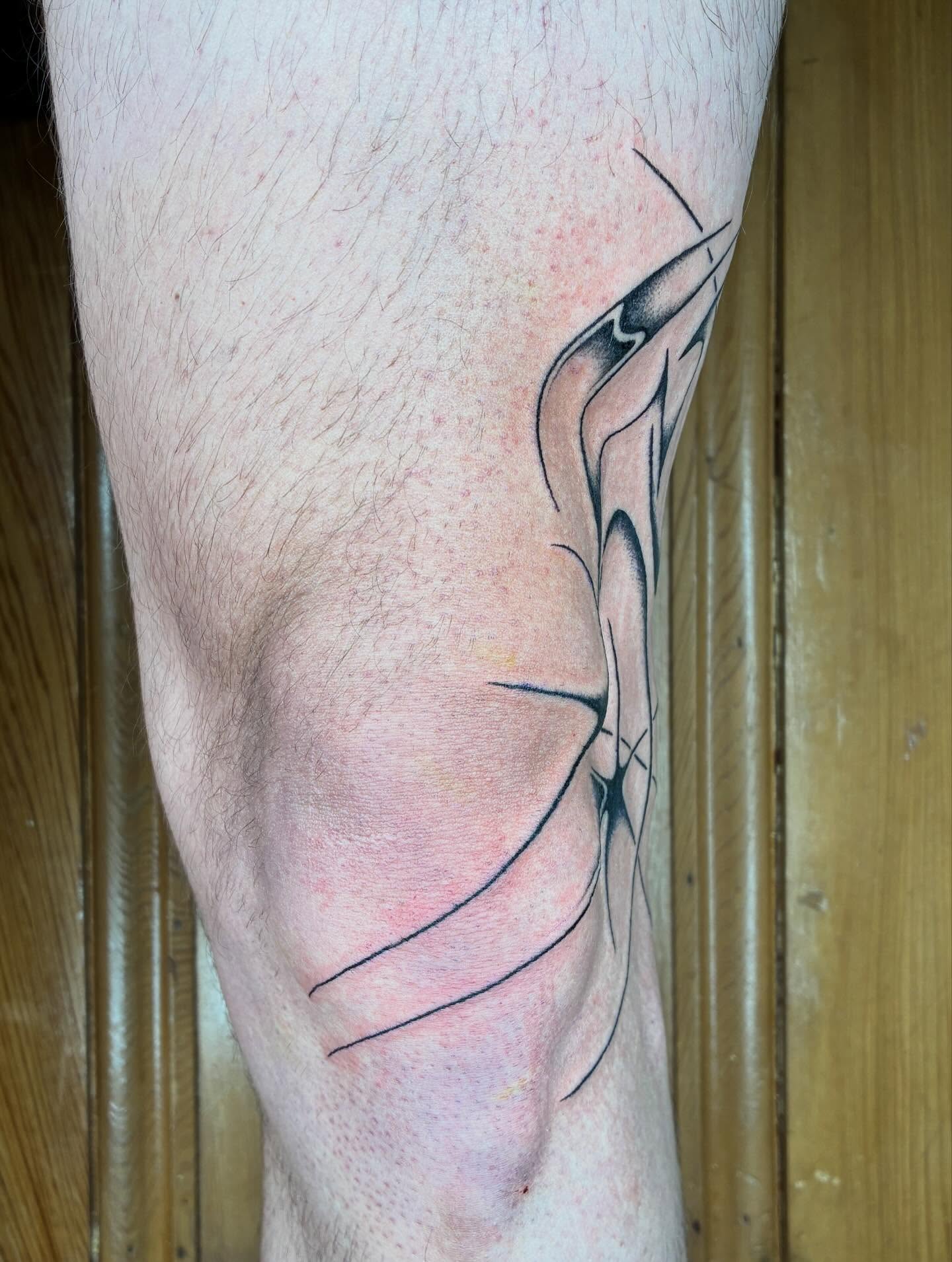 Abstract design tribal tattoo on the calf by Steven Sessler, San Francisco, California
