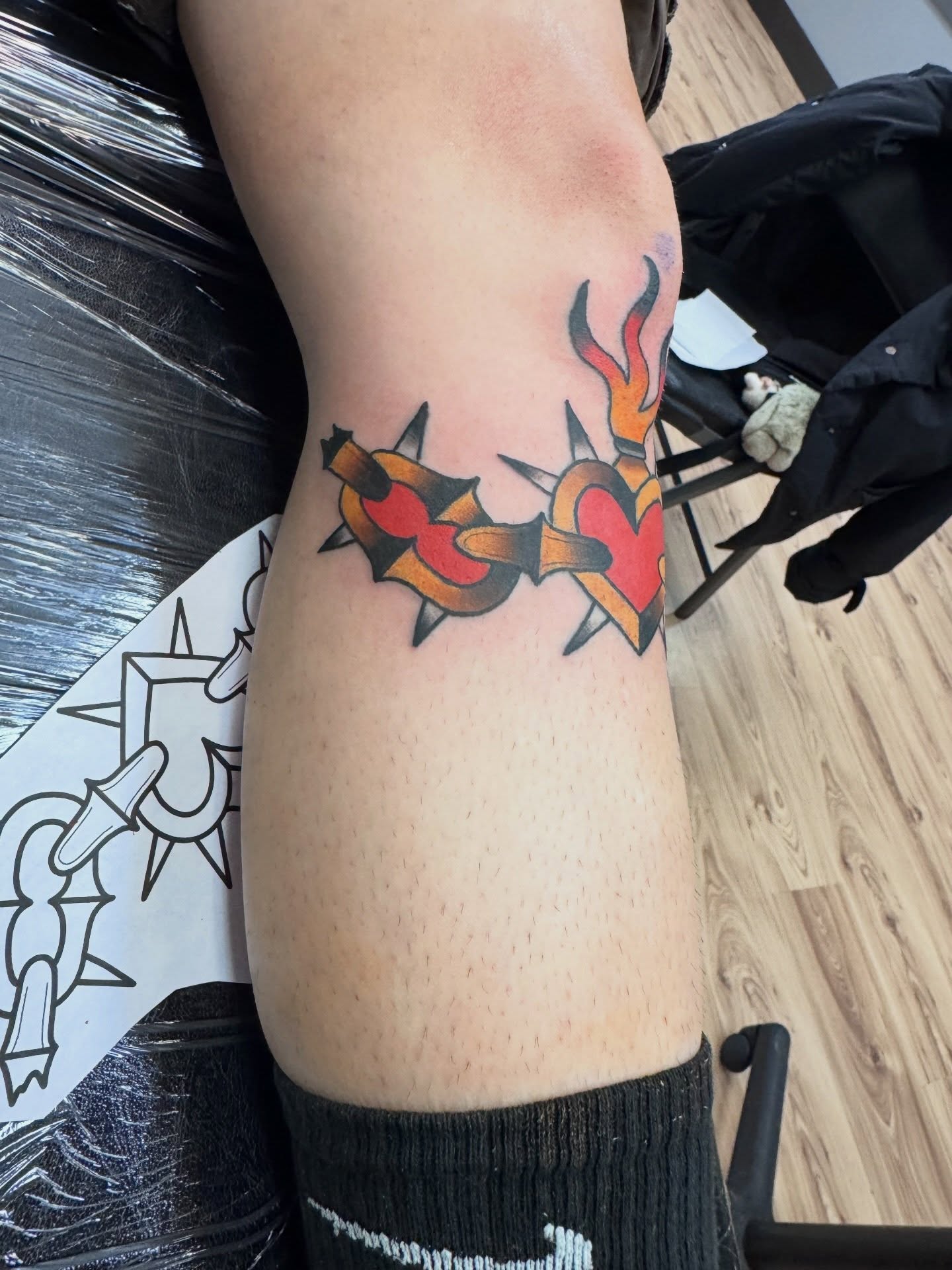 Heart with spikes American traditional tattoo on the forearm by Justin Chapman, Des Moines, Iowa