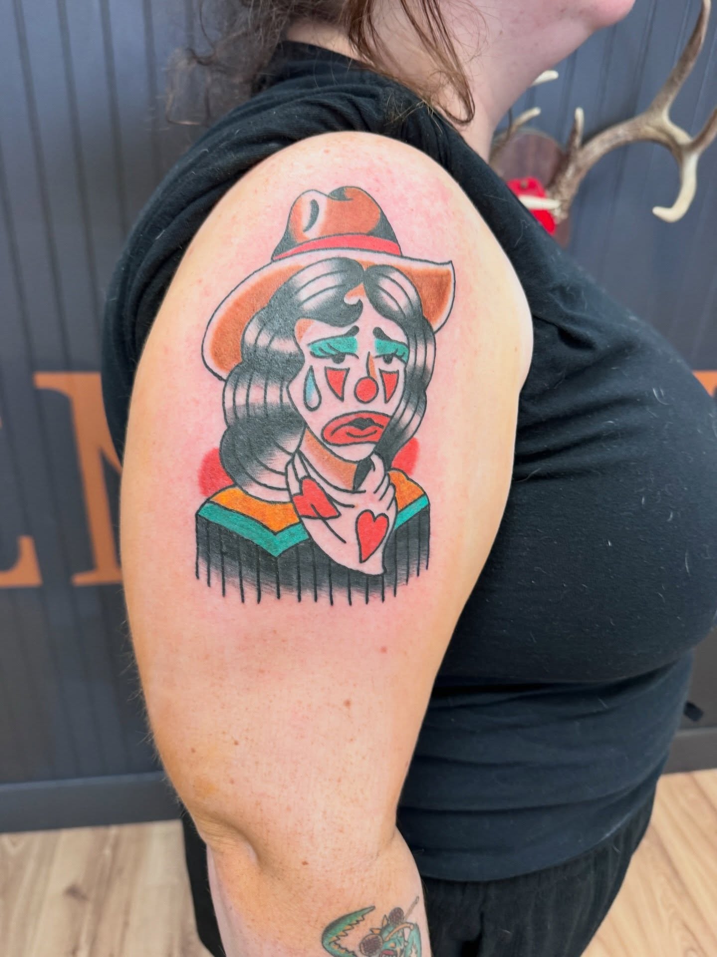 Clown American traditional tattoo on the shoulder by Justin Chapman, Des Moines, Iowa