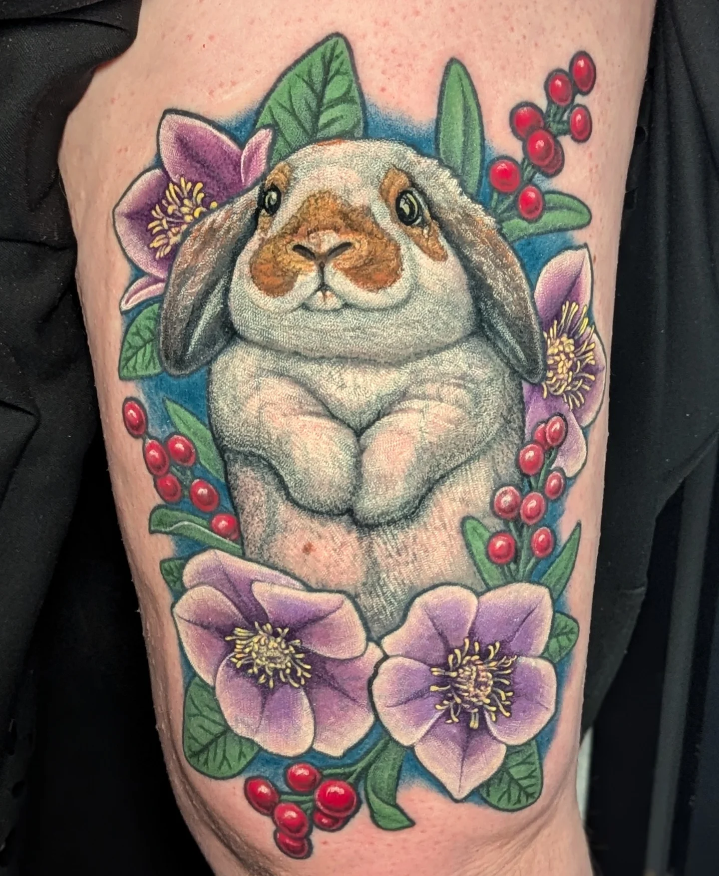 Muscular rabbit realism tattoo on the thigh by Jay Trip