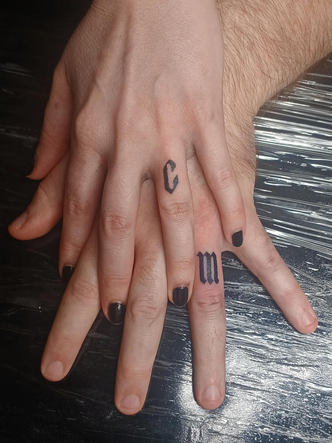 Lettering lettering script tattoo on the hand by Amber Tattoos
