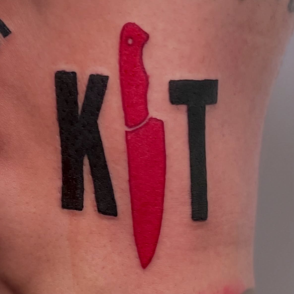 Knife and axe American traditional tattoo on the forearm by Jacob Webb