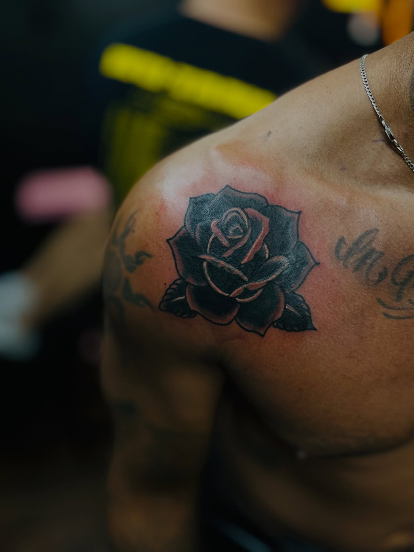 Rose black and grey tattoo on the shoulder by Eli Flores