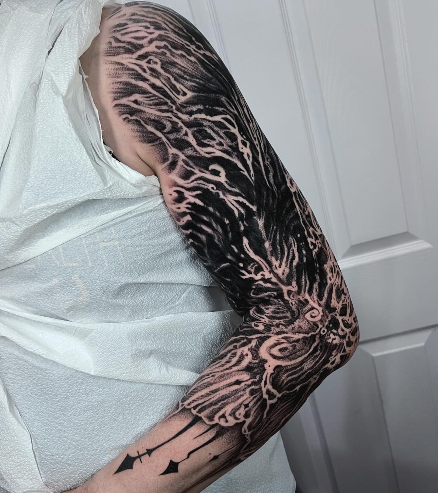 Tattoo by @annawolfftattoos — black_and_grey, dotwork