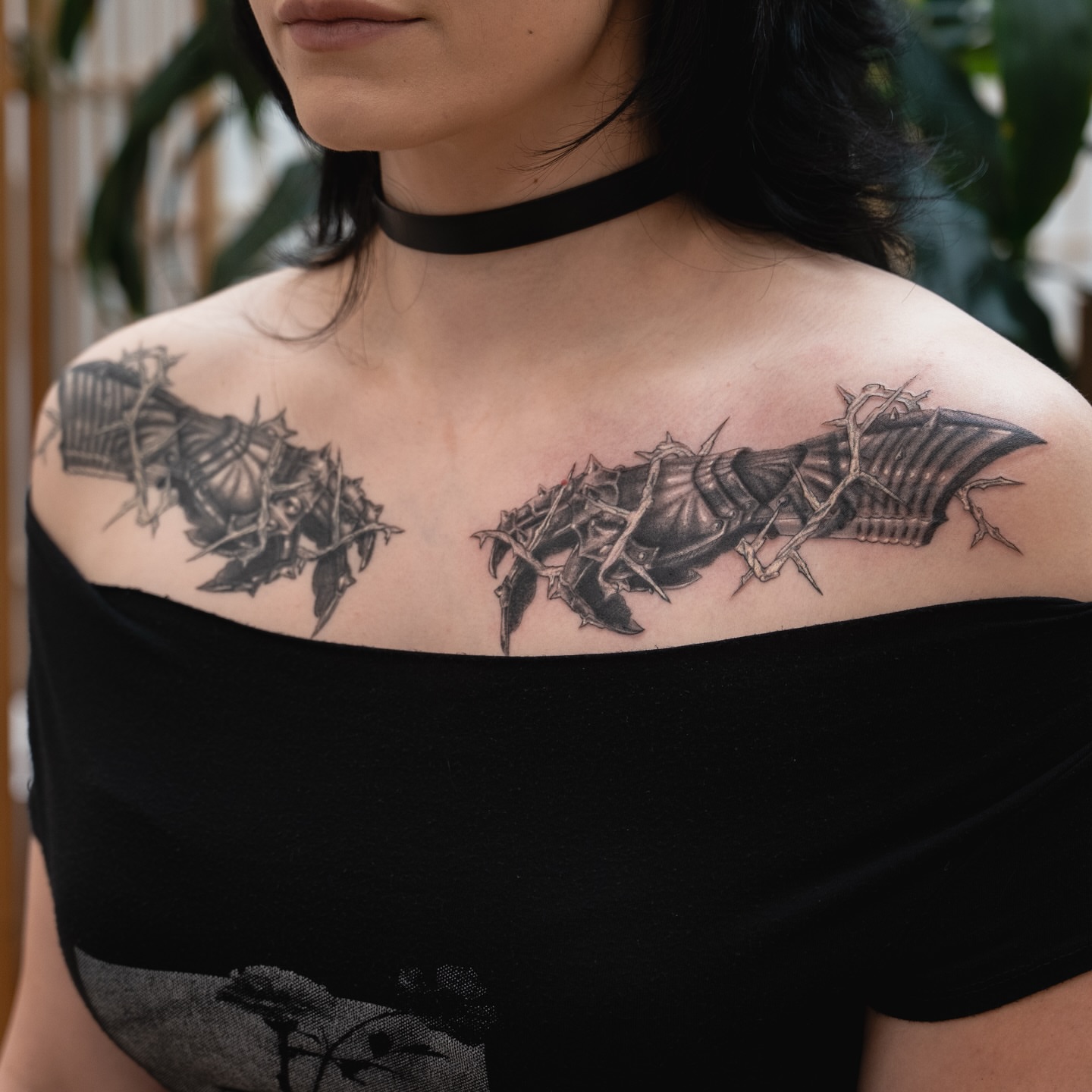 Barbed wire and roses realism tattoo on the shoulder by James Fernella, San Francisco, California