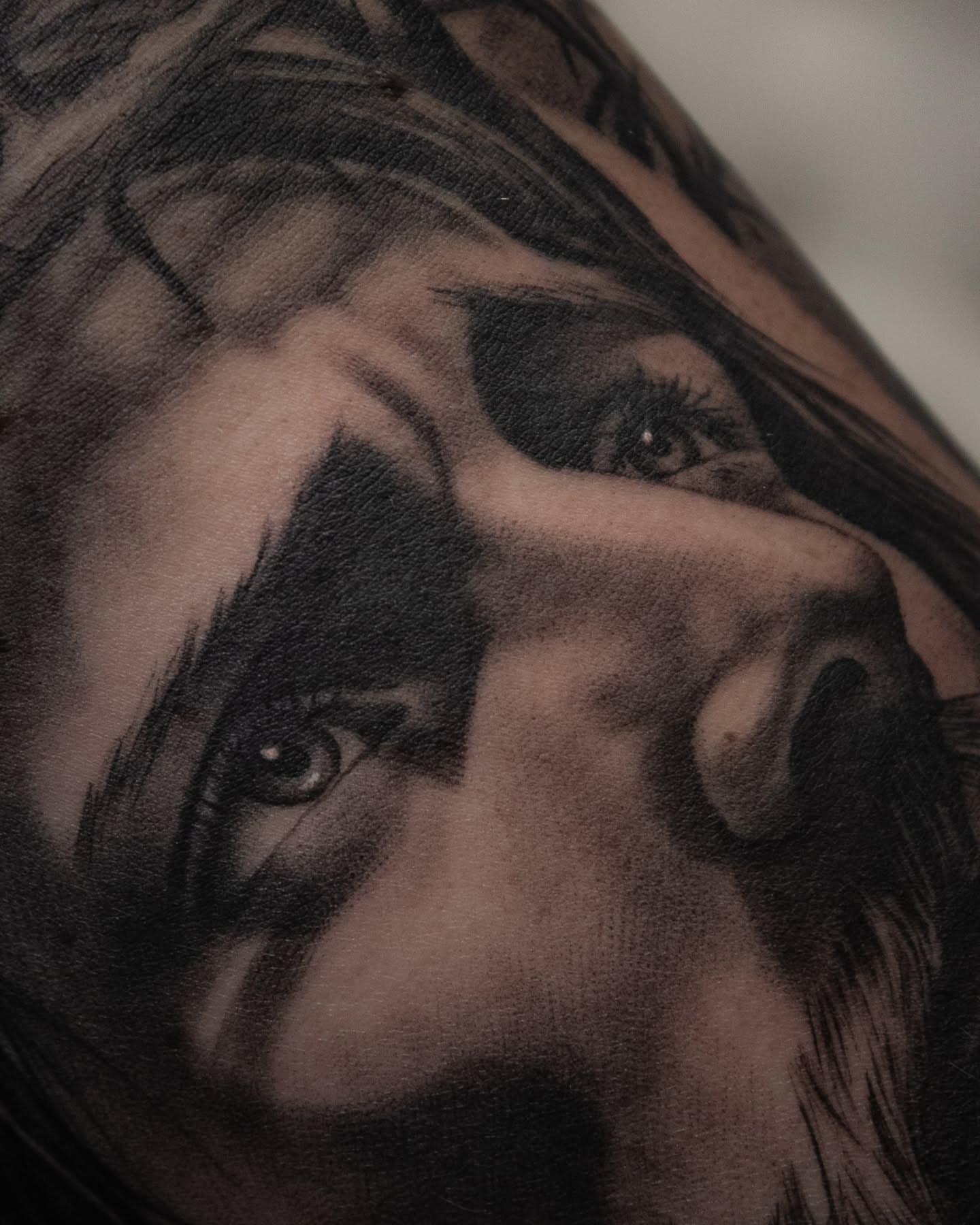 Woman's face realism tattoo on the forearm by Erik Bonilla