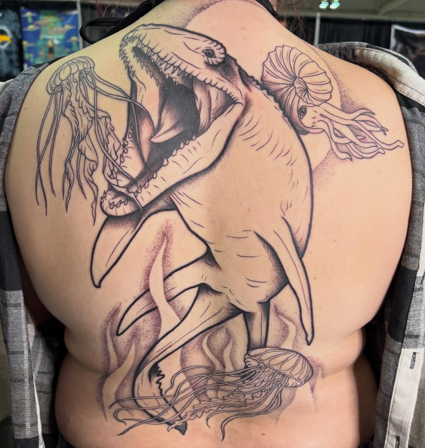 Prehistoric creature realism tattoo on the back by Olivia Buch