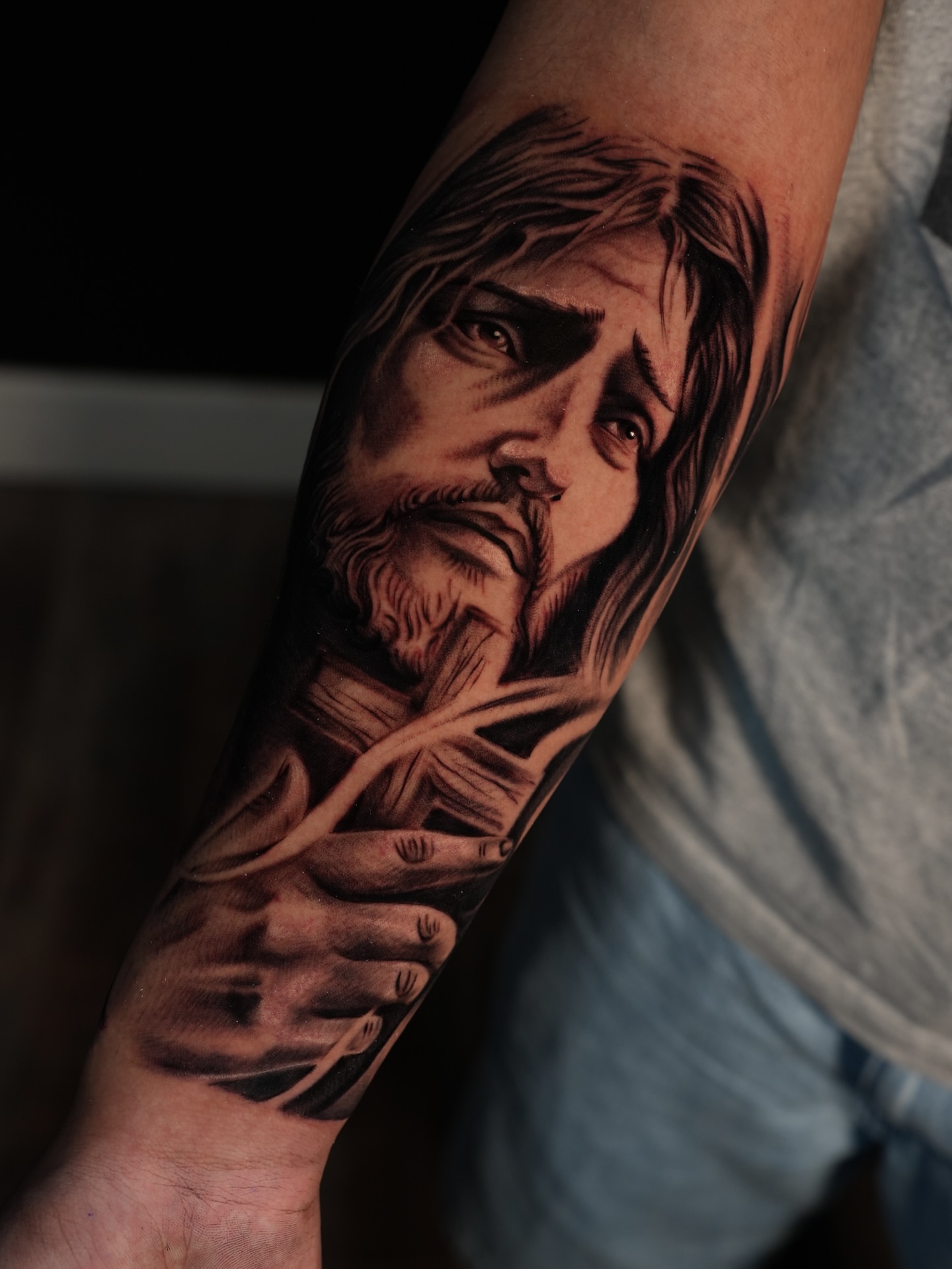 Religious figure realism tattoo on the forearm by BillydaKid